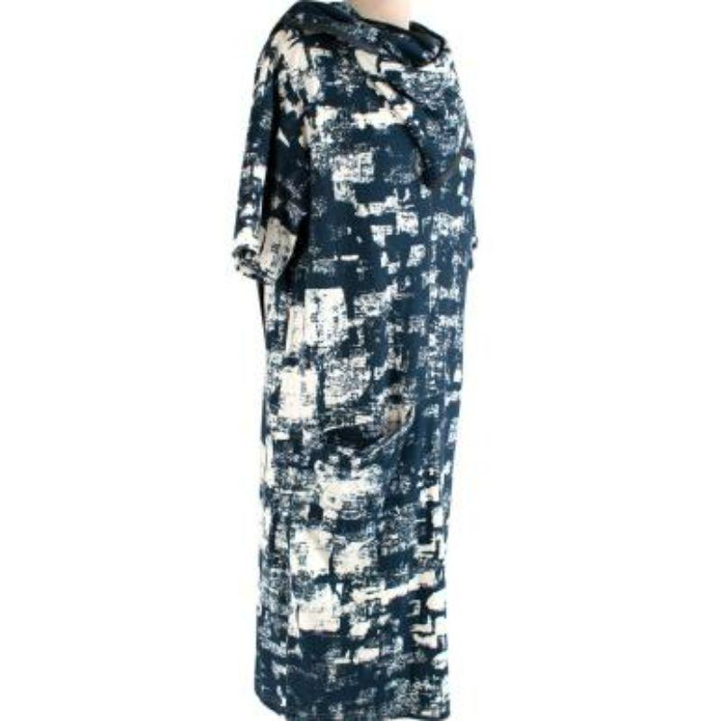 Celine blue & white graphic print tunic
 
 
 
 - Wool jersey with an allover graphic print in blue and white
 
 - Draped, self-tie neckline which can be wrapped a variety of ways
 
 - Loose fitting silhouette can be worn as a dress, or layered over