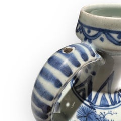 Blue white Japanese porcelain ewer, Arita, Japan, circa 1660-1680.