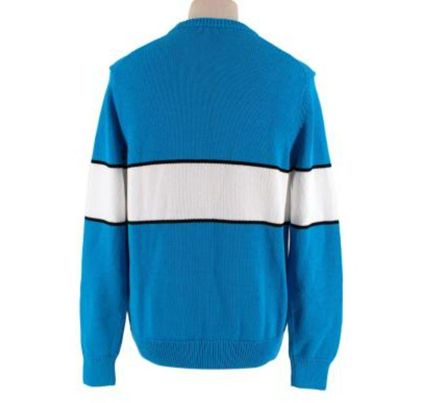 Givenchy Blue & White Logo Intarsia Cotton Jumper
 
 - Bicolour cotton knit, with backwards intarsia logo across the chest
 - Ribbed round neck, cuffs and hem
 - Classic fit
 -Medium weight
 
 Materials 
 100% Cotton 
 Ribs
 98% Cotton
 2% Polyamide