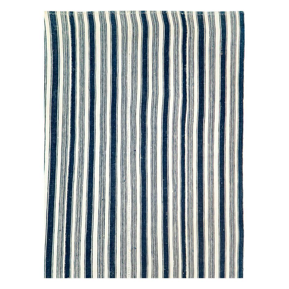 A vintage Persian flatweave Kilim accent rug in square format handmade during the mid-20th century in shades of blue and white.

Measures: 5' 9