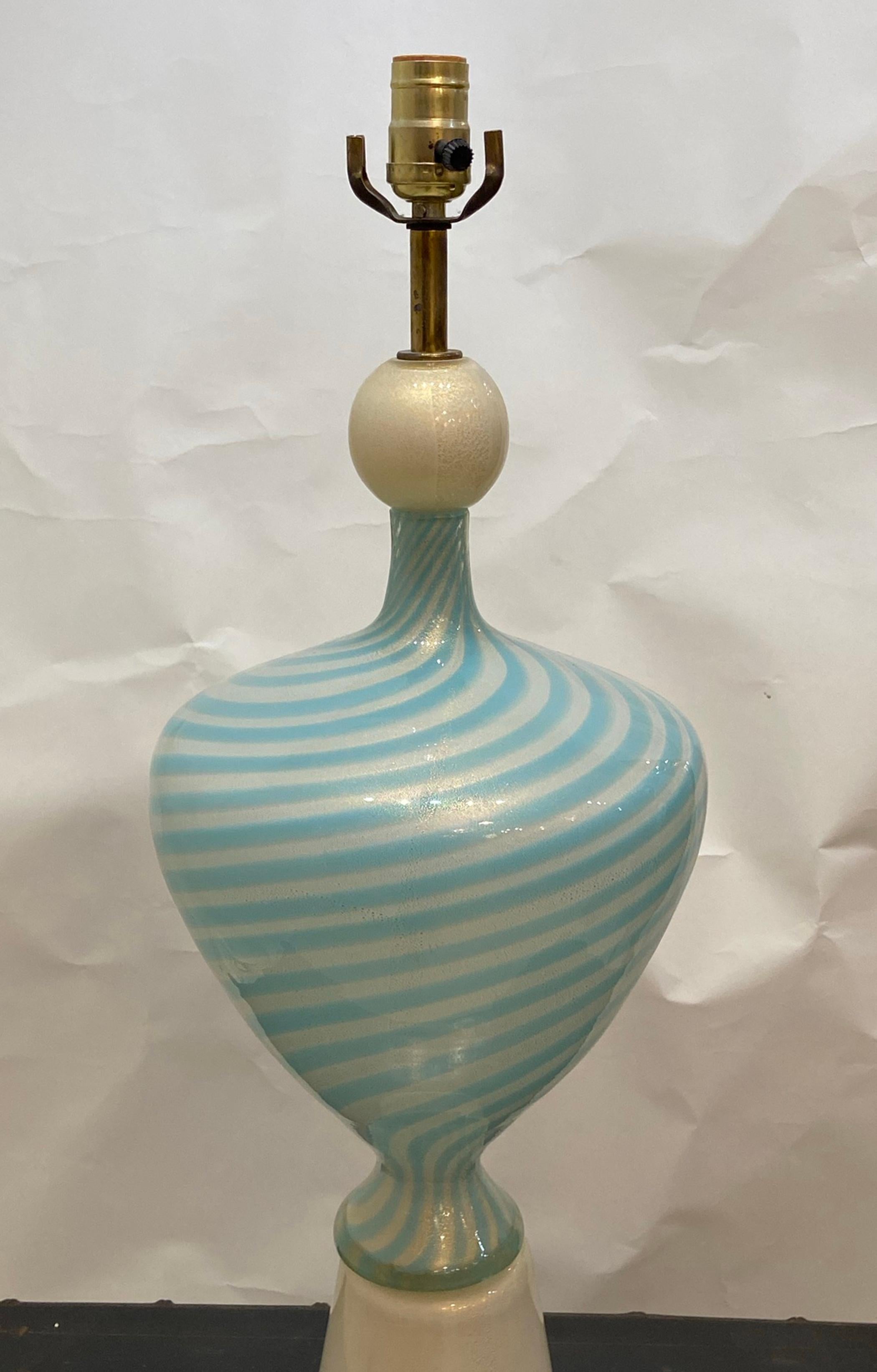 Blue swirl with white accent Murano art glass table lamp. In very good condition good working order ready to use. 30 inches high to top of socket.