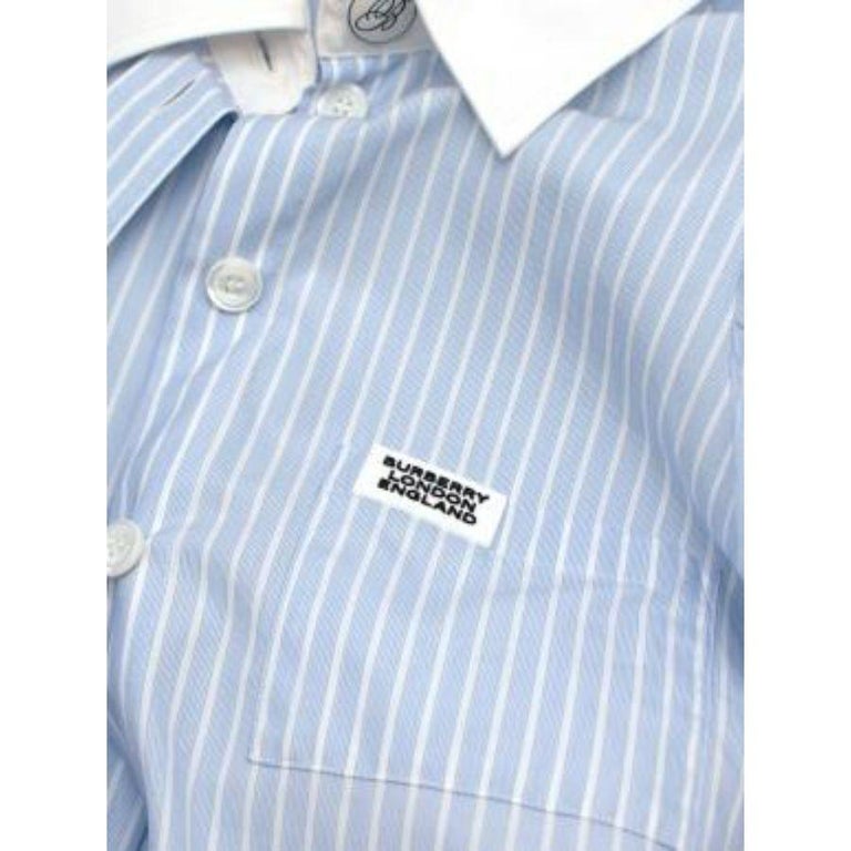 Blue and white pinstripe long sleeve with ruffle shoulder detail… M