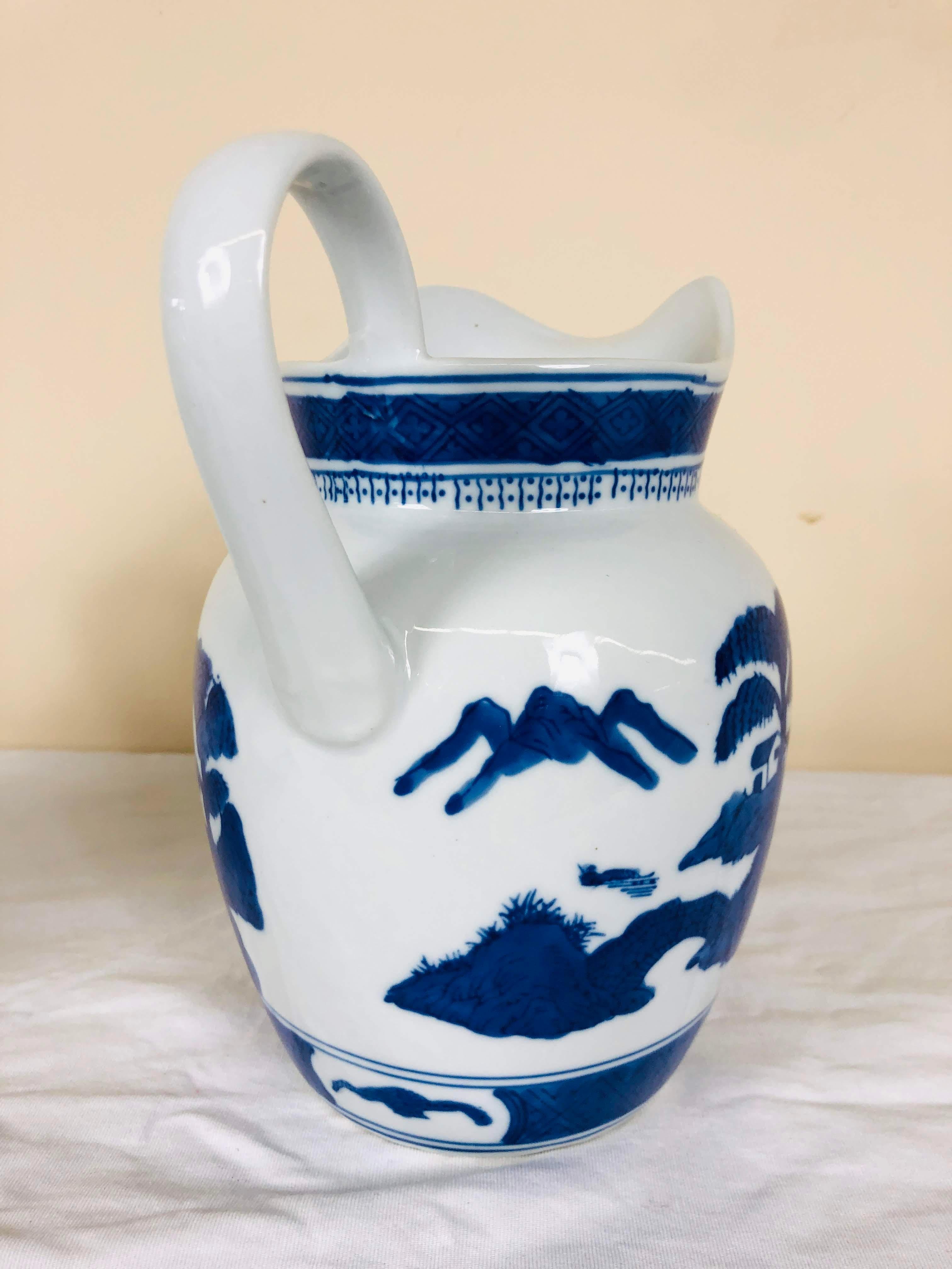 Blue and white porcelain pitcher.