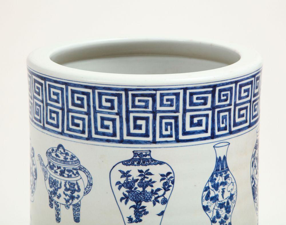 blue and white ceramic umbrella stand