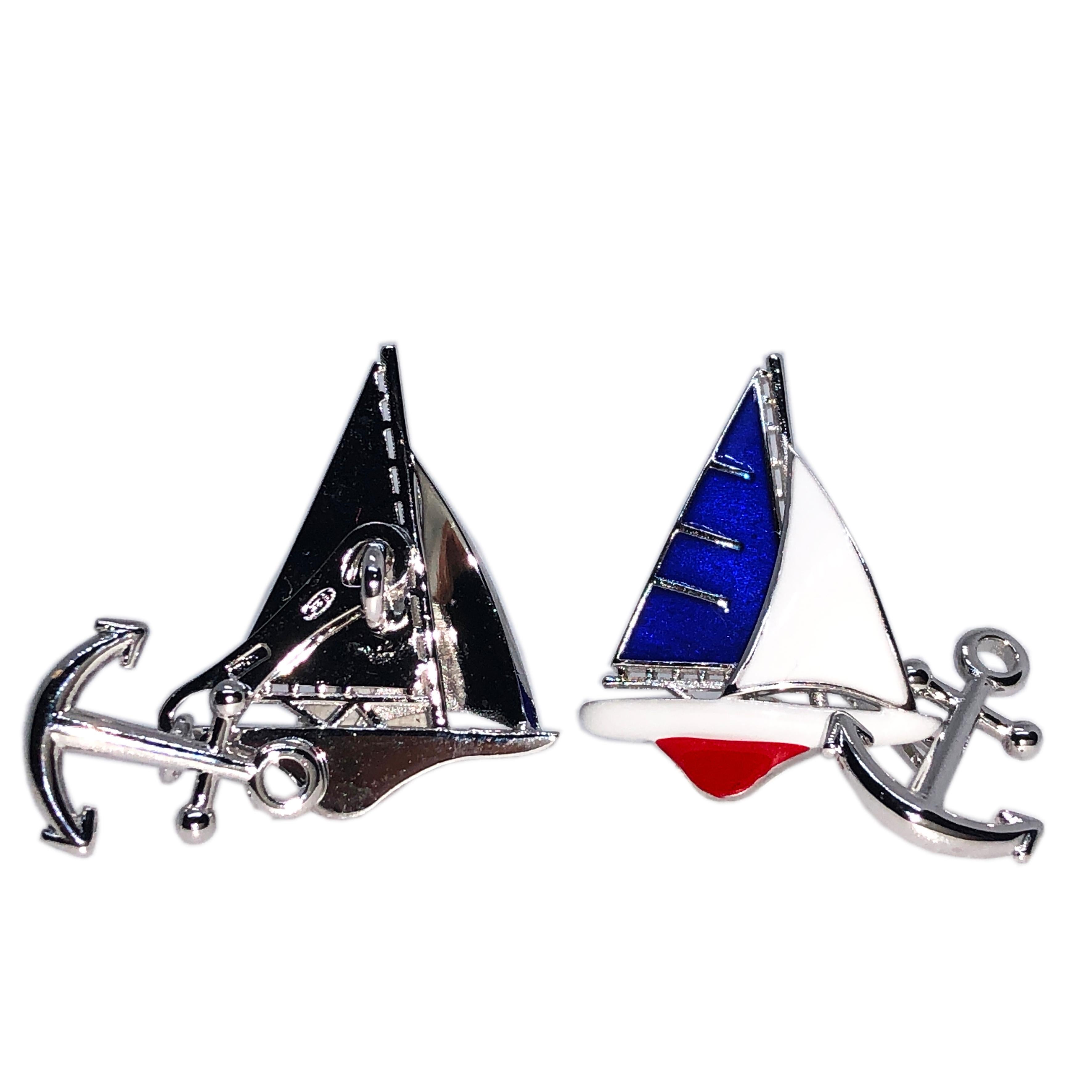 Unique, chic yet timeless, Blue, White and Red Hand Enameled Sailing Boat, Little Anchor Back, Sterling Silver Cufflinks.

In our smart fitted Tobacco Suede Leather Case and Pouch.