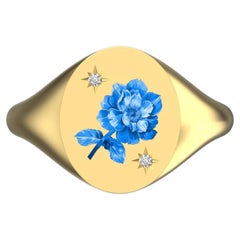 Signet ovale avec roses bleues et blanches et diamants, or jaune 18 carats