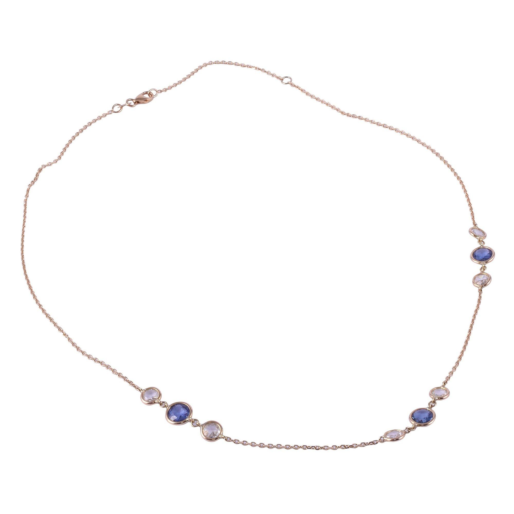 Estate Italian blue & white sapphire 18K necklace. This estate necklace is crafted in 18 karat yellow gold featuring bezel set blue sapphires at 3.0 carat total weight and another 3.0 carat total weight of bezel set white sapphires. [KIMH