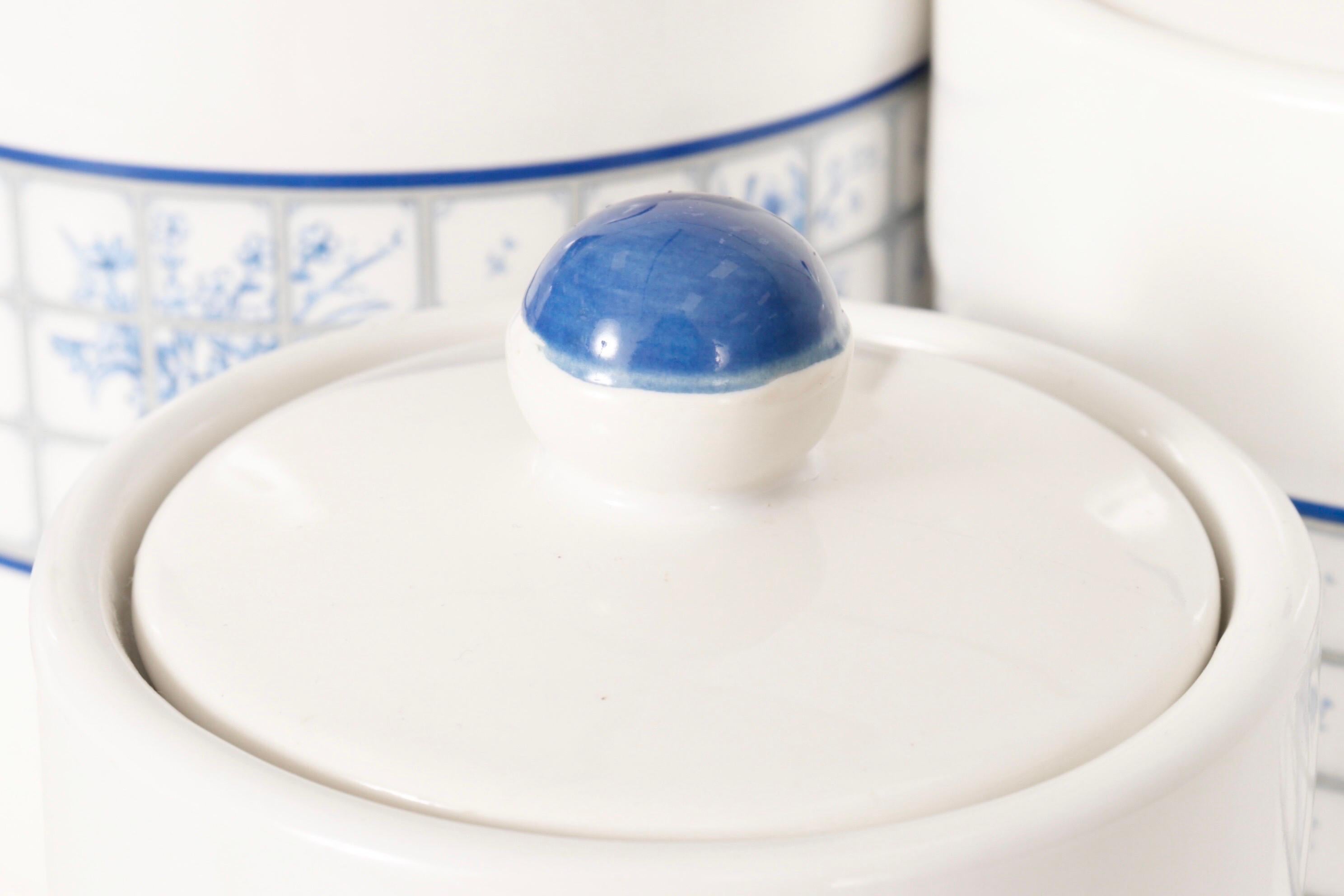 blue and white ceramic canisters