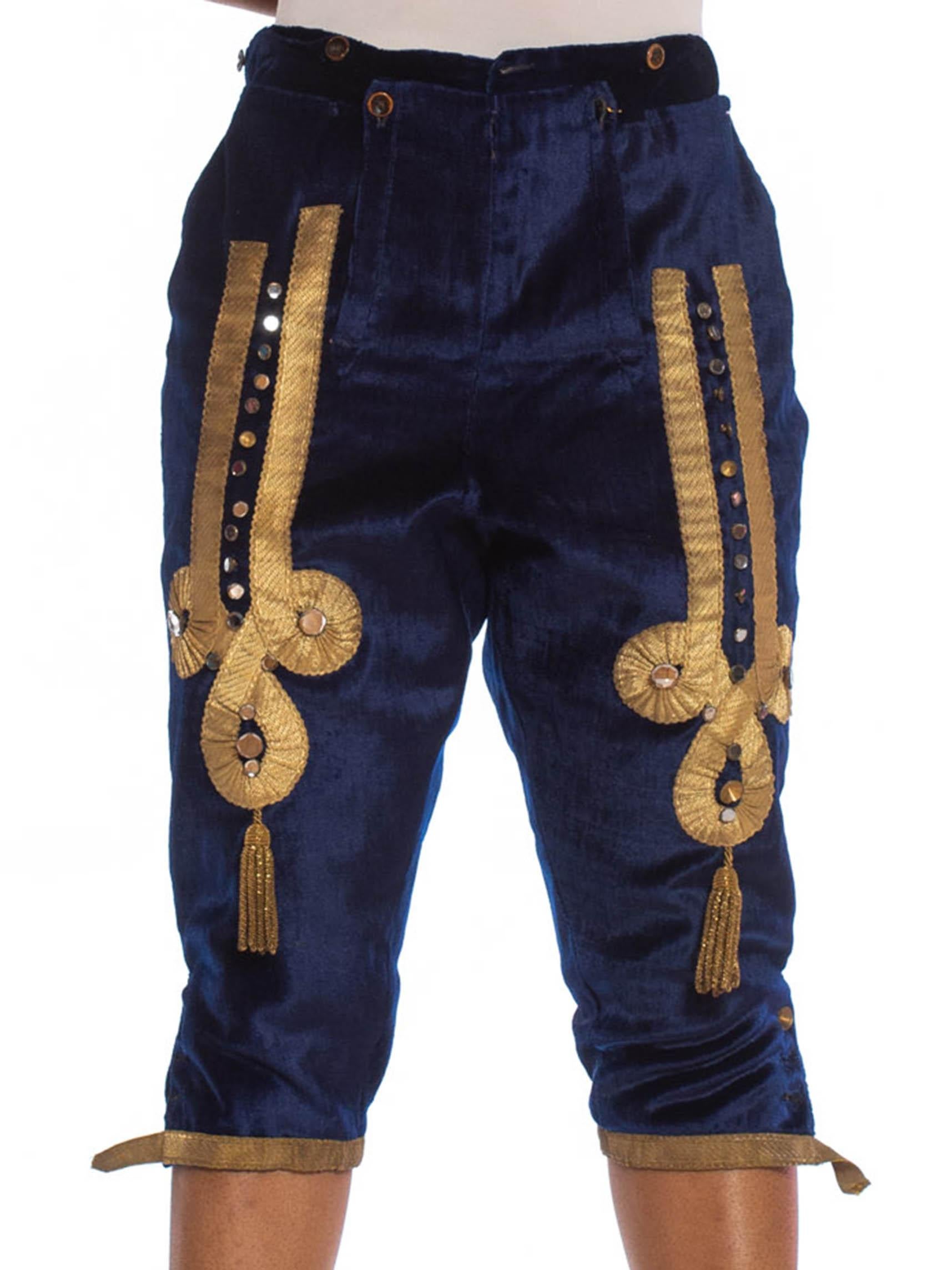 A few small holes and missing buttons however no rot nor stains nor smells. phenomenal condition for being over 200 years old.  Blue  Wool Velvet Men's Antique 1700S Historical Folk Pants With Metallic Embellishments & Tassels 
