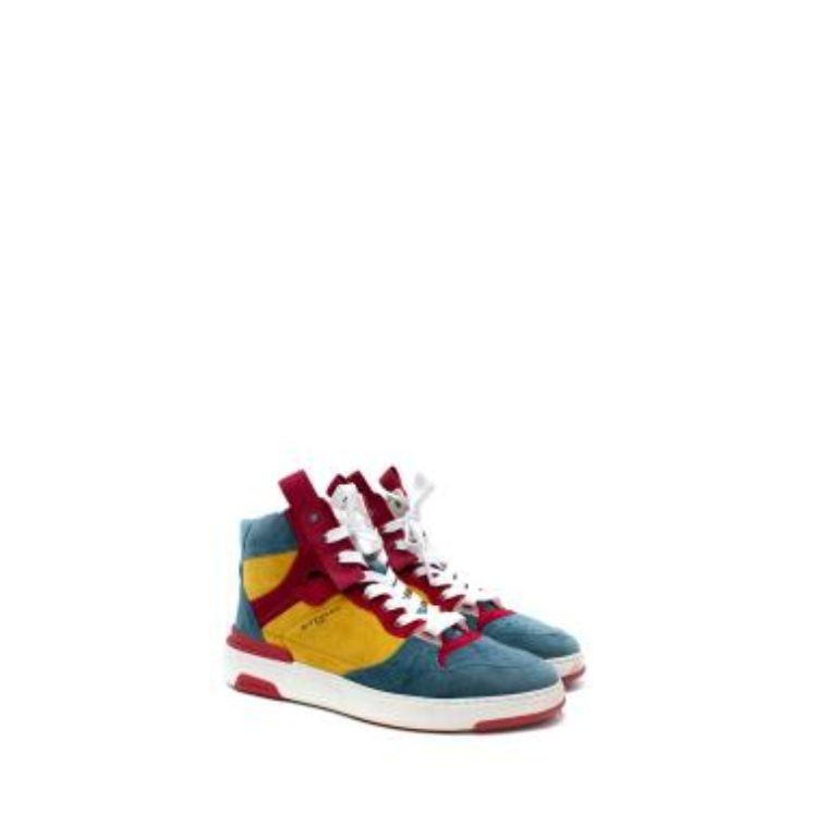 Givenchy Blue & Yellow Ribbed Velvet Three-Toned Wing Sneakers
 

 - High-top panelled velvet sneakers colour-blocked in blue, yellow, and red. 
 - Perforated detailing at round toe and lace-up closure in white featuring logo hardware at eyerows 
 -