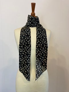 Blue Yves Saint Laurent tie.