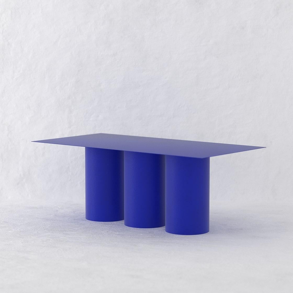 The Tripod Dining Table is a monolithic piece conceptualized as a dining table suitable for both, indoor and outdoor. 
Crafted by hand in metal and coated with a matte electrostatic finish it's size can be customized.
The Tripod Dining Table seats 8
