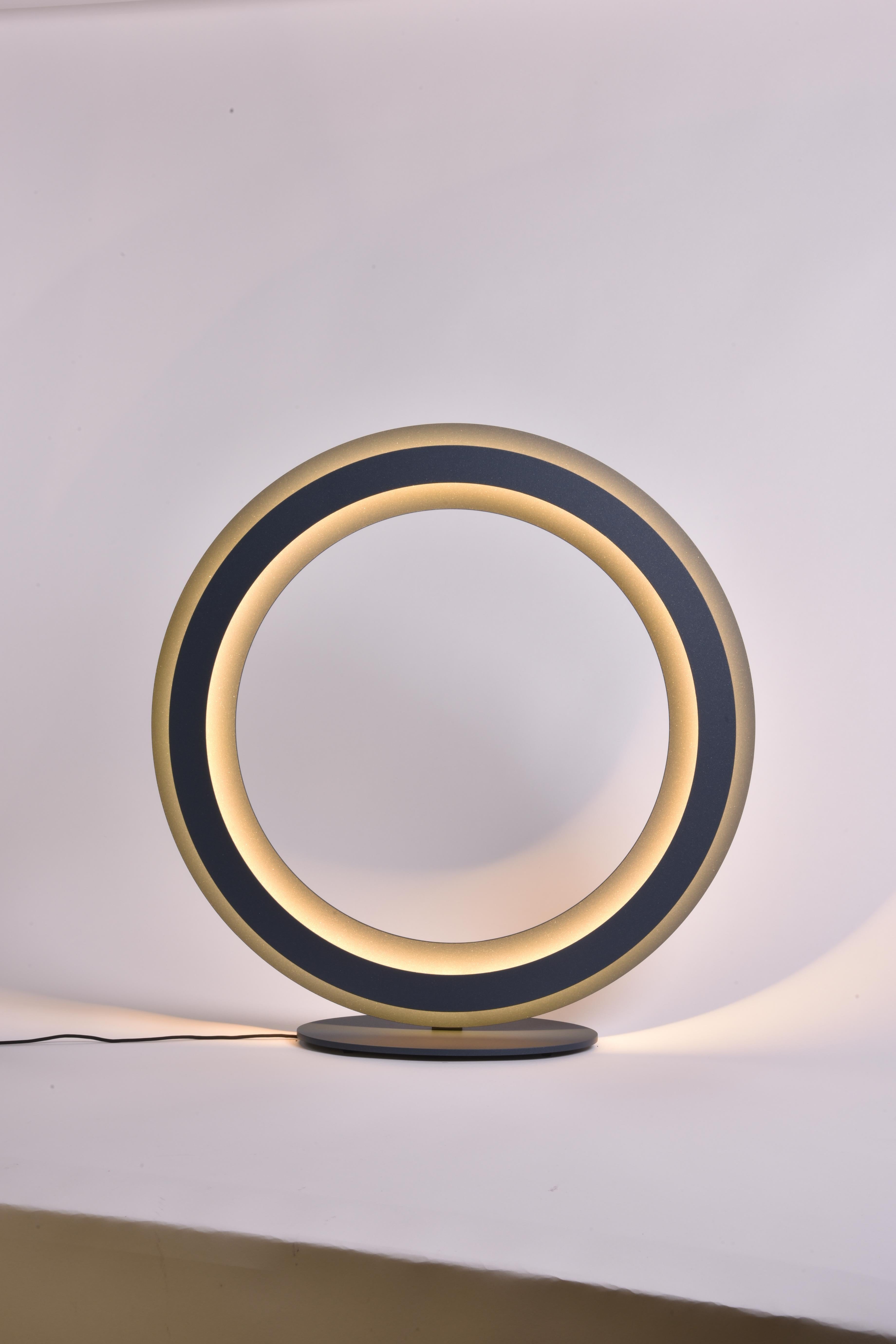 Blue Zepto Table Lamp by Le Deun Luminaires
Dimensions: W 50 x D 14 x H 51 cm. 
Materials: Epoxy painted steel.

They are a French company established in 1997, specializing in designing and manufacturing low-energy consumption lighting. They have