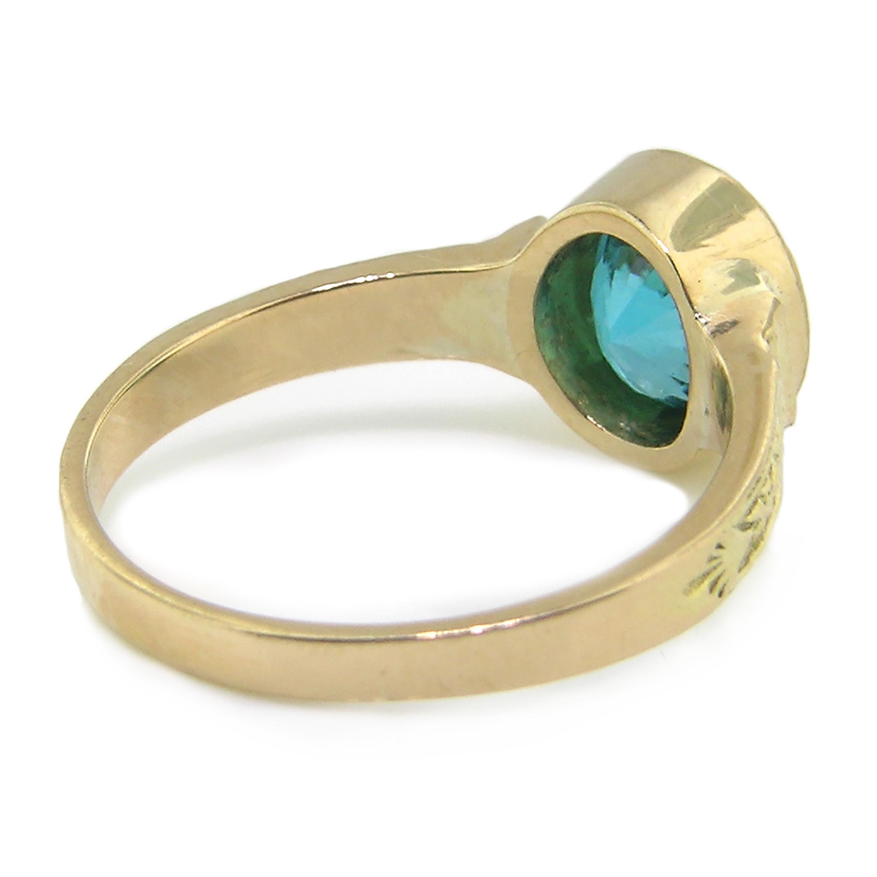 Oval Cut Blue Zircon and 18 Karat Gold Ring