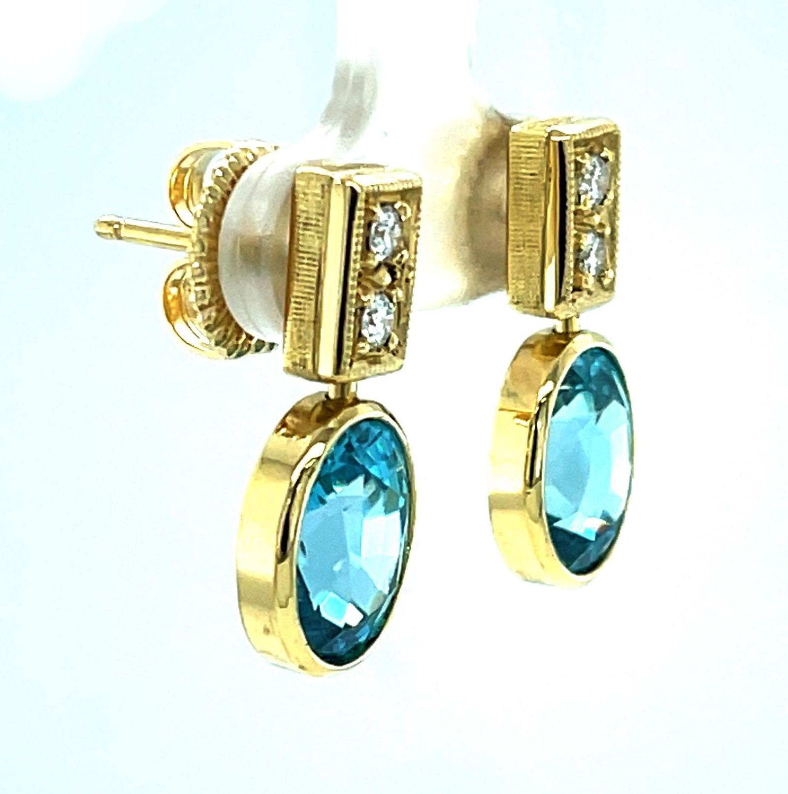 Oval Cut Blue Zircon and Diamond Drop Earrings in Yellow Gold, 9.38 Carats Total For Sale