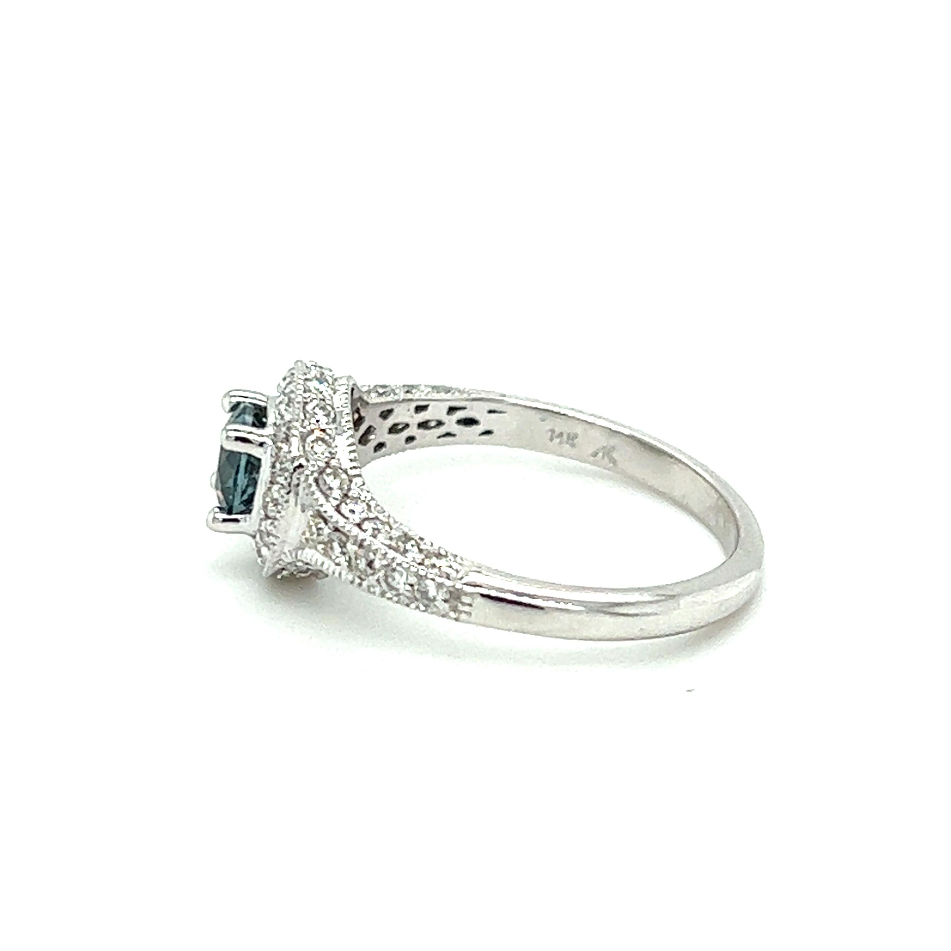 Contemporary Blue Zircon and Diamond Halo Ring in 14k White Gold For Sale