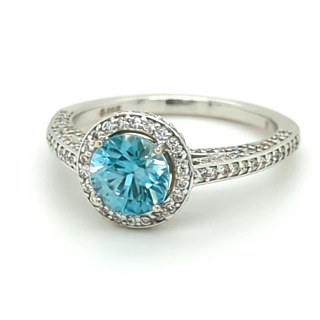 Romantic Blue Zircon and Diamond Halo Ring in 14kt White Gold For Sale