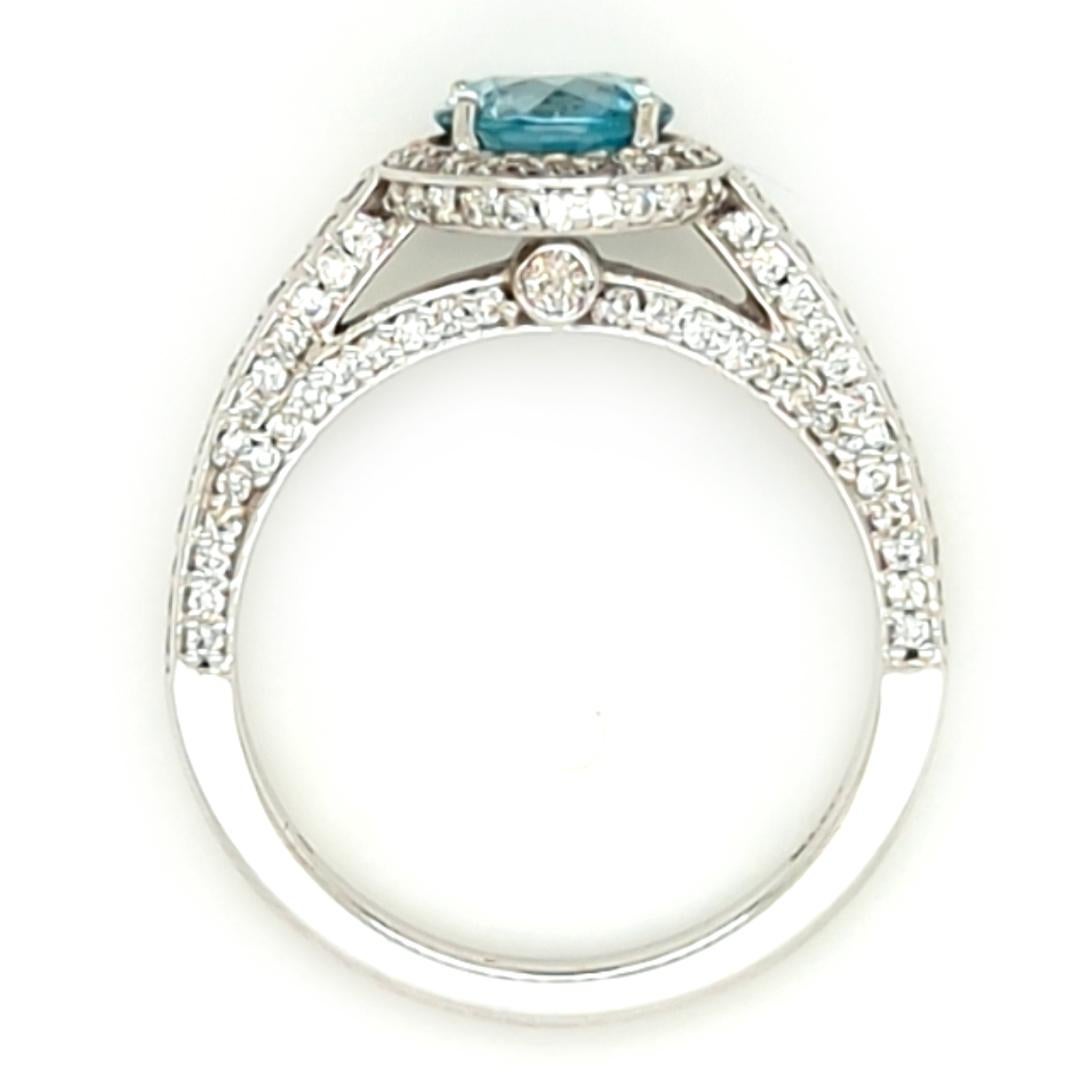 Round Cut Blue Zircon and Diamond Halo Ring in 14kt White Gold For Sale