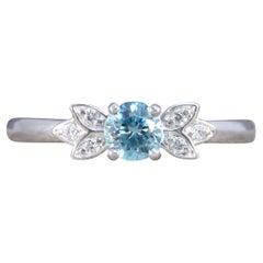 Blue Zircon and Diamond set Butterfly Ring in Platinum Blue Zircon and Diamond set Butterfly Ring in Platinum