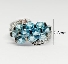 Blue zircon and white zircon 18K WG plated over sterling silver