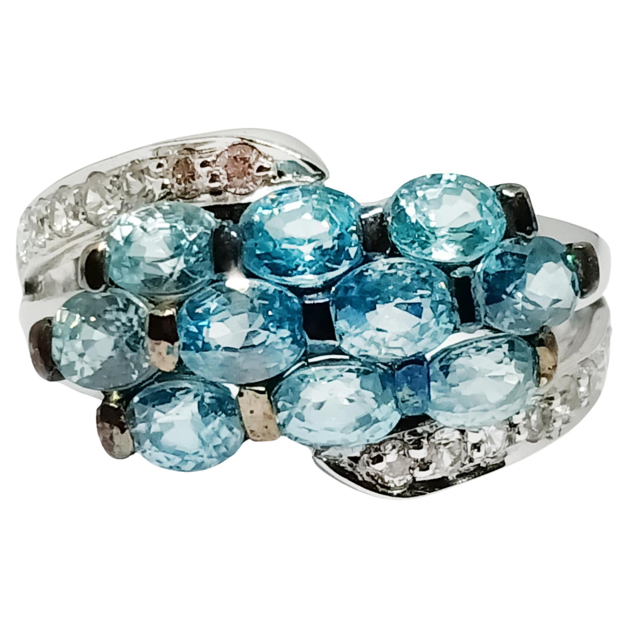 Blue zircon and white zircon 18K WG plated over sterling silver For Sale
