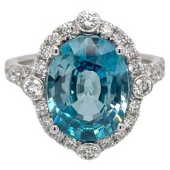 Blue Zircon & Diamond Halo Ring in 18K White Gold