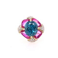Blue Zircon, Pink Sapphires and White Diamonds Gold Ring in 18K Yellow Gold