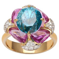 Blue Zircon, Pink Sapphires and White Diamonds Gold Ring in 18K Yellow Gold