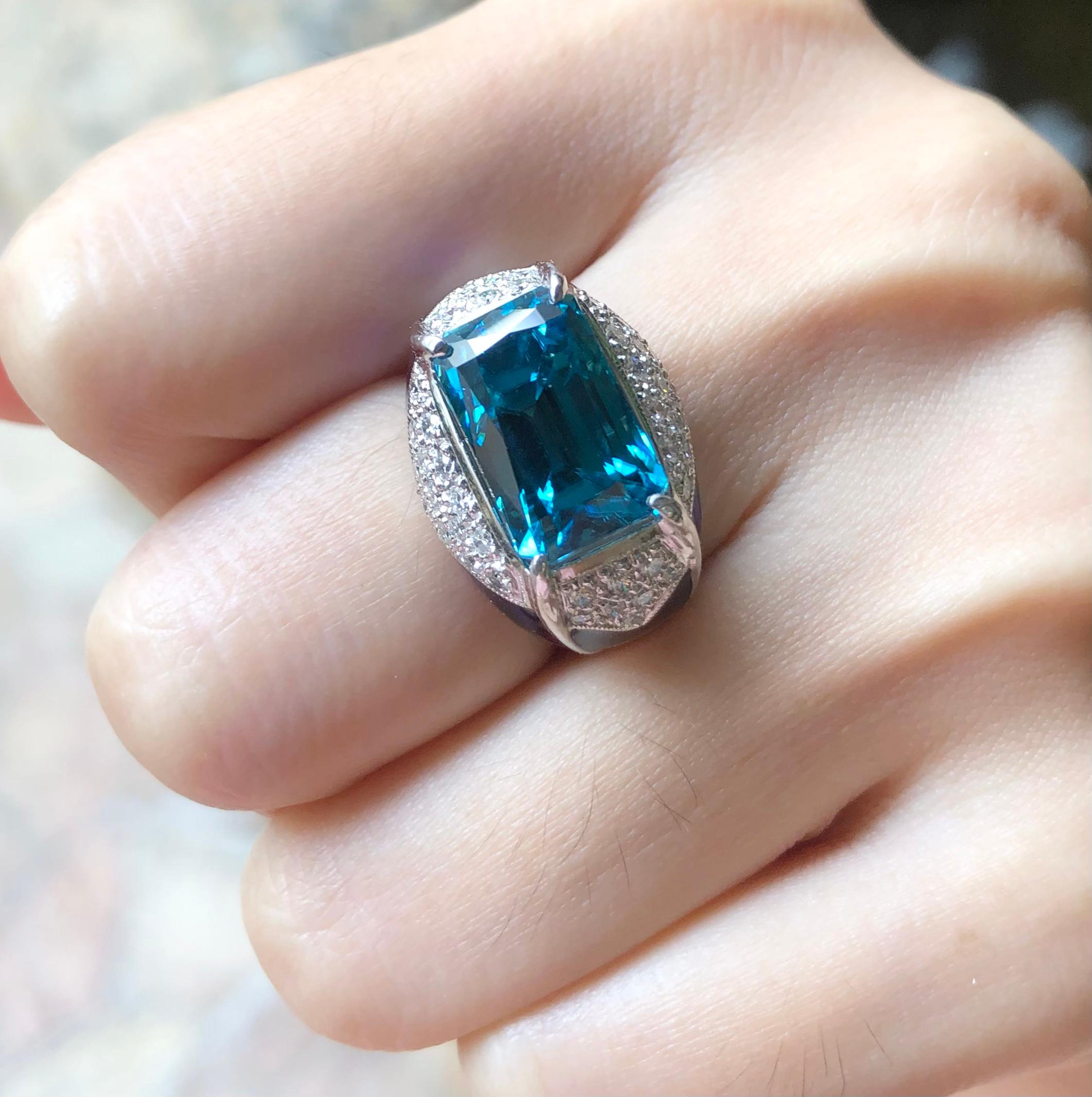 Blue Zircon 12.18 carats with Diamond 0.63 carat Ring set in 18 Karat White Gold Settings

Width:  1.3 cm 
Length: 1.4 cm
Ring Size: 50
Total Weight: 11.47 grams

Blue Zircon
Width:  1.3 cm 
Length: 0.8 cm

