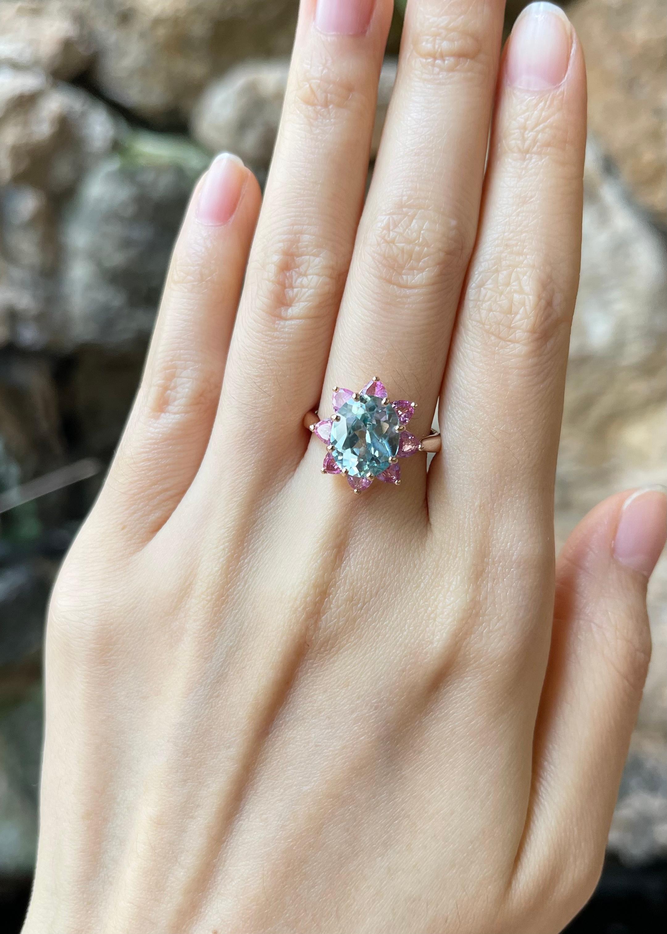 Blue Zircon 4.80 carats with Pink Sapphire 1.54 carats Ring set in 18K Rose Gold Settings

Width:  1.5 cm 
Length: 1.6 cm
Ring Size: 54
Total Weight: 6.46 grams

