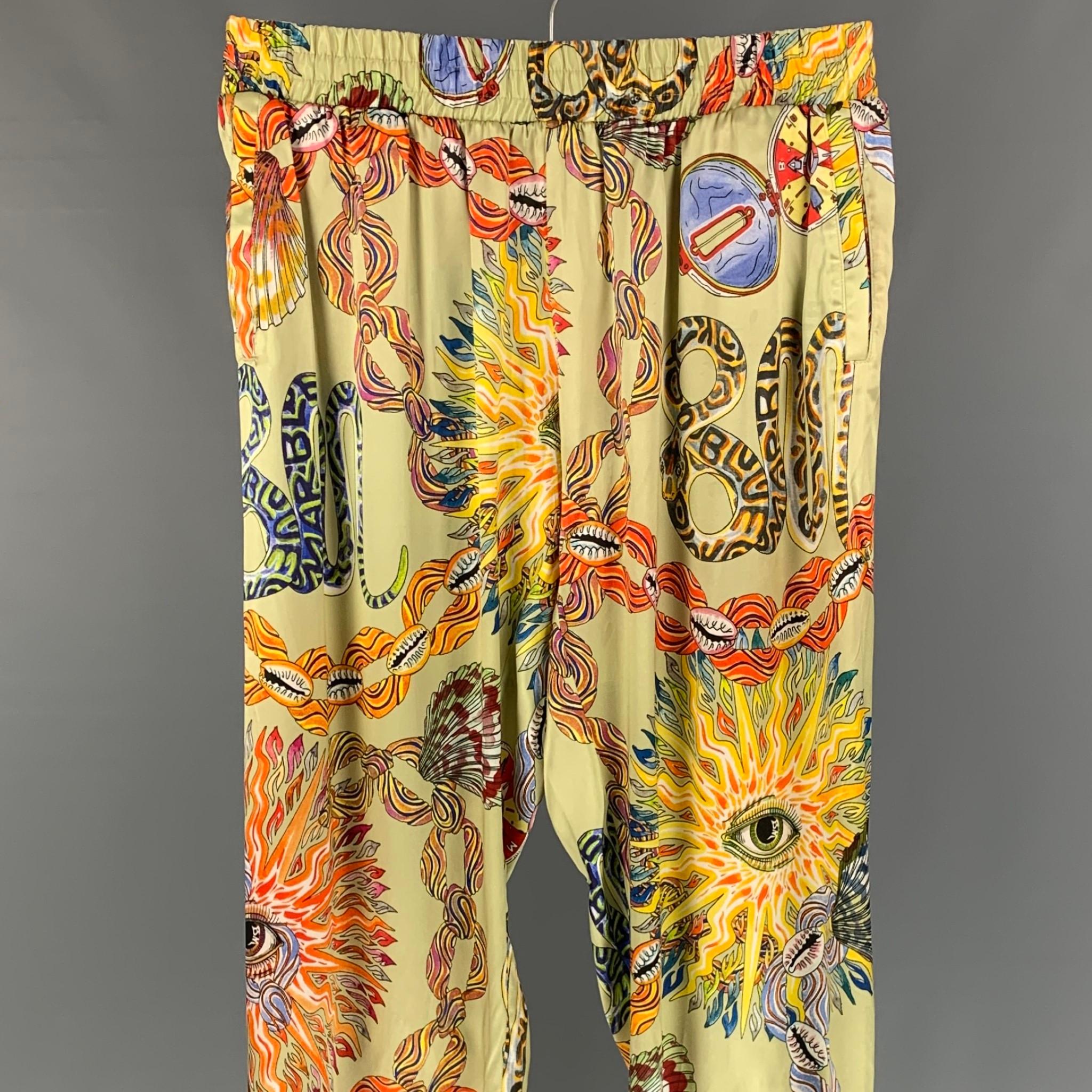 BLUEMARBLE casual pants comes in a multi-color print silk featuring a loose fit, slit pockets, drawstring, and a elastic waistband. Made in Portugal. 

Excellent Pre-Owned Condition.
Marked: S

Measurements:

Waist: 30 in.
Rise: 11 in.
Inseam: 33