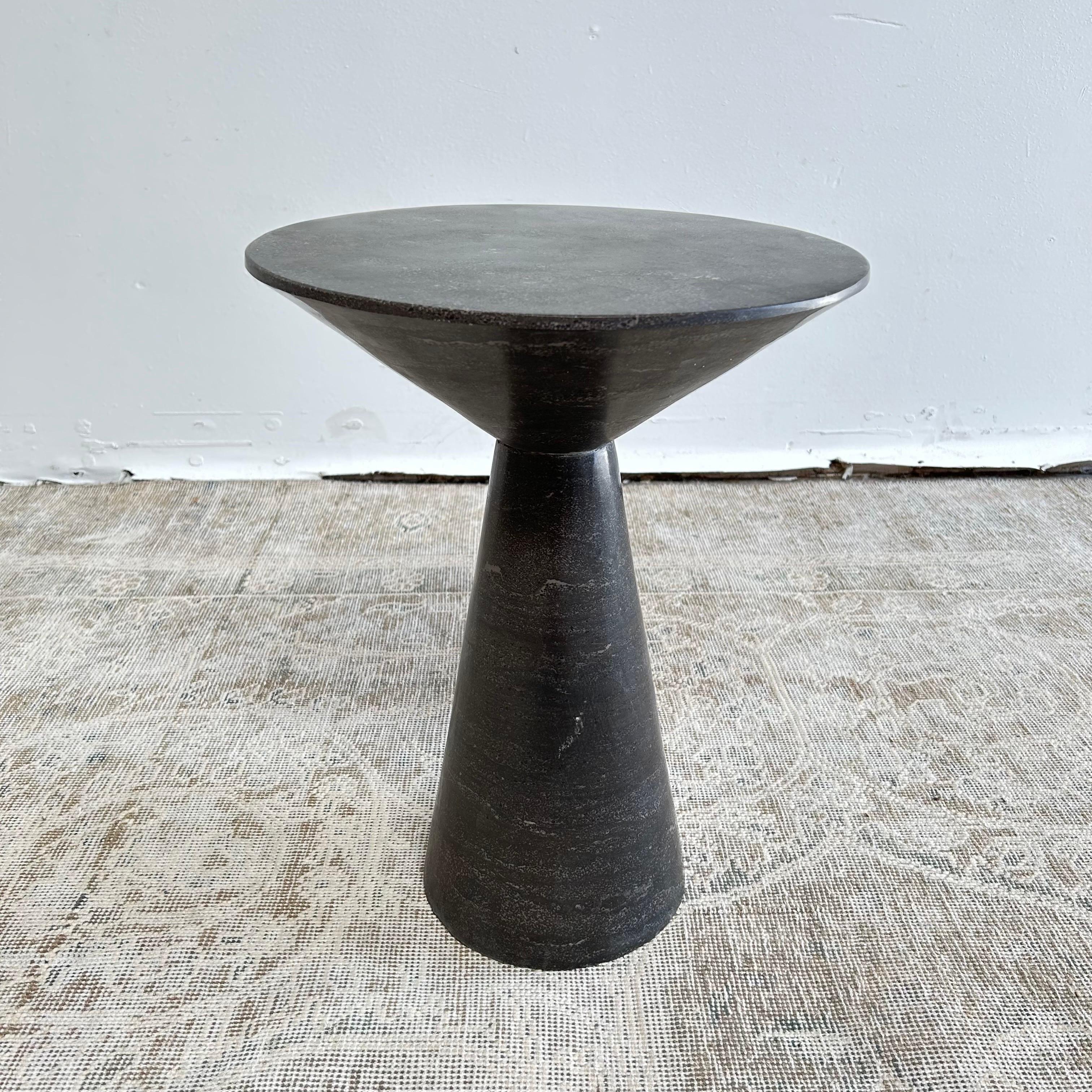 Modern side table in a washed charcoal color
Material: Bluestone
Finish: Washed Black Stone Finish
Width: 14 in
Depth: 14 in
Height: 19 in
Volume: 2.16 cu ft
Weight: 72 lbs
this item can not ship by UPS due to it weight. Pick up or freight carrier