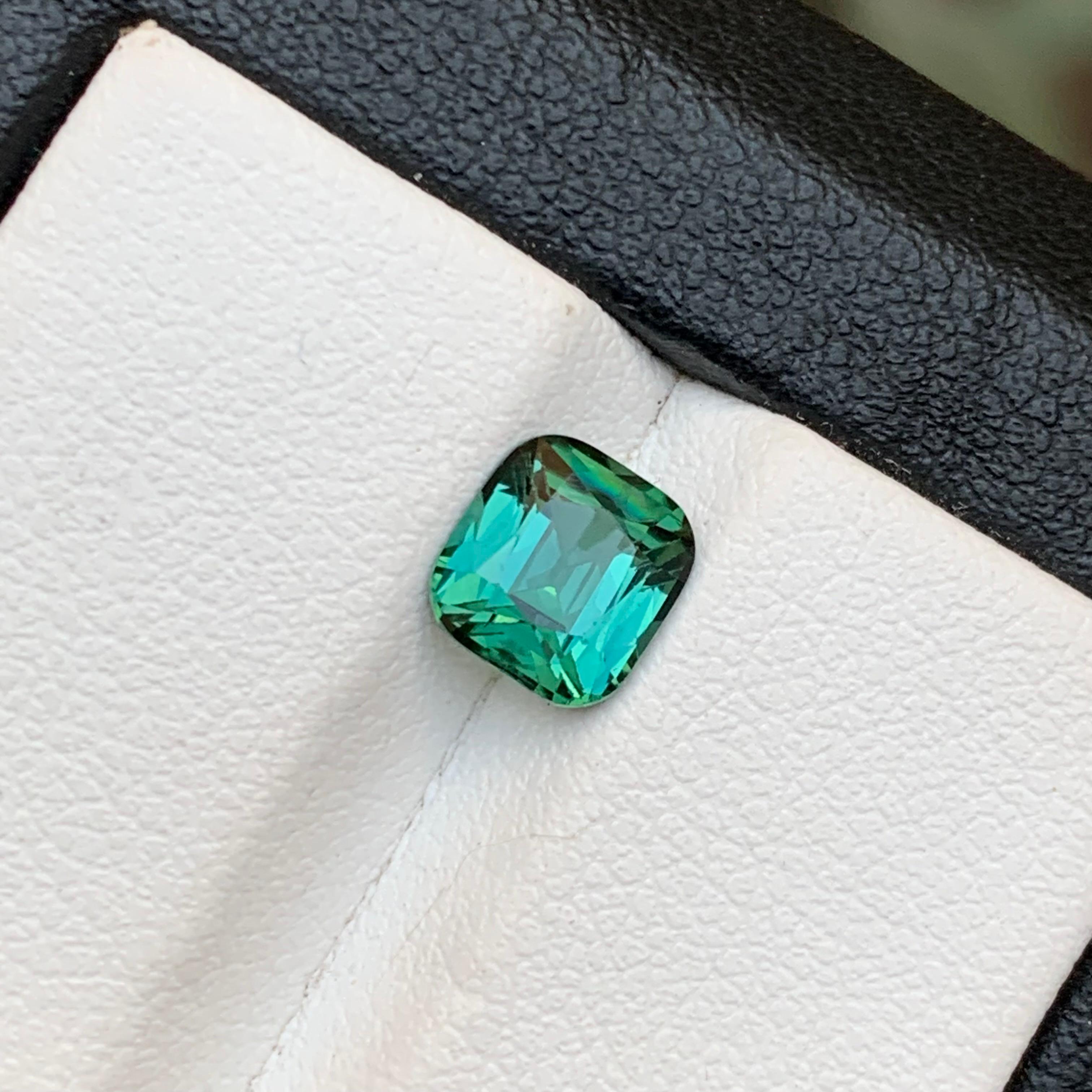 Bluish Green Natural Tourmaline Loose Gemstone for Ring, or any other Jewelry Setting Cushion Cut from Kunar, Afghanistan!!

💎 GEMSTONE TYPE: Tourmaline
⚖️ WEIGHT: 1.45 Carat
🪚 SHAPE & CUT: Cushion Cut
📏 SIZE (MM): 6.68 x 6.24 x 4.45
🌈 COLOR: 