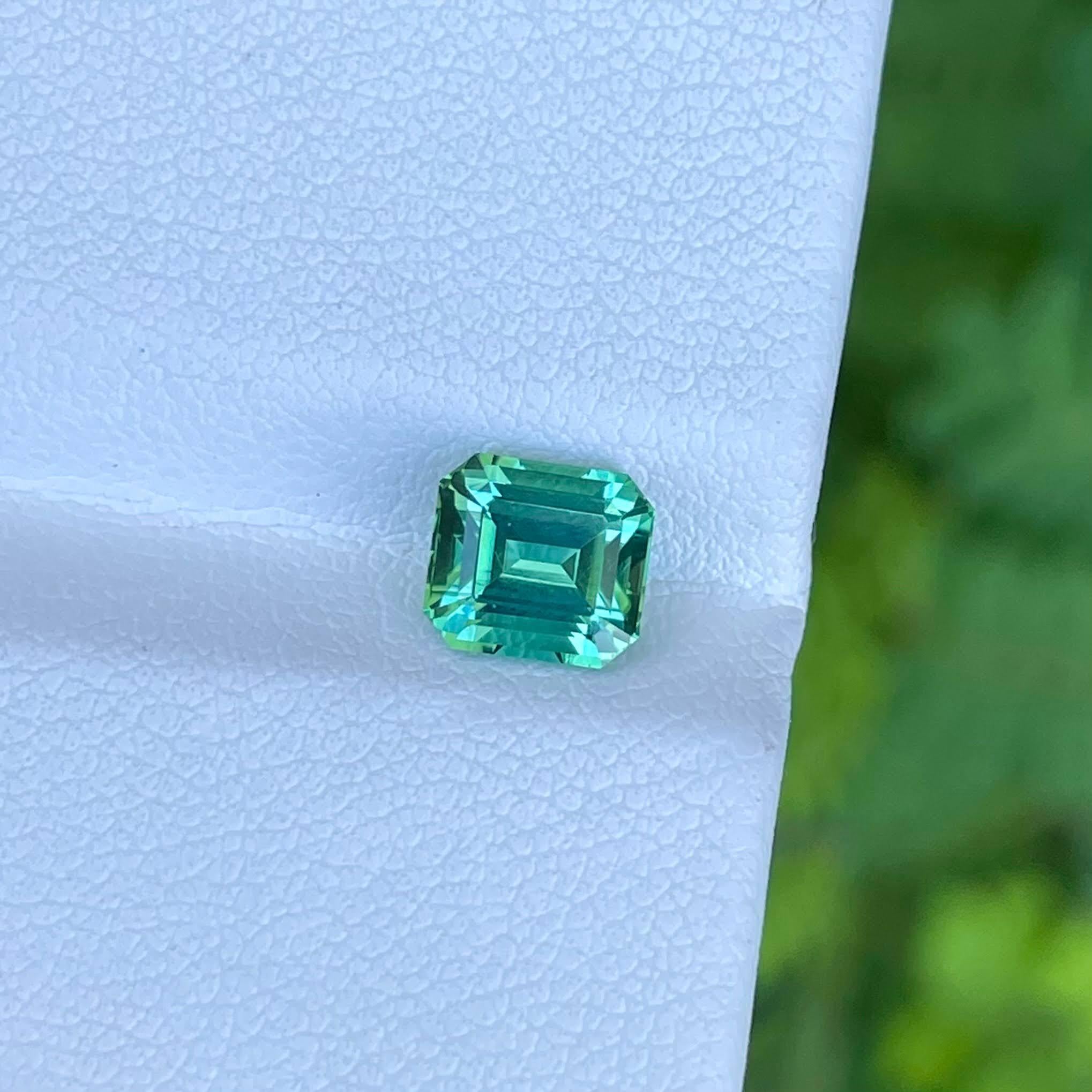 1.50 carats 
6.68x6.02x7.68 mm
Clarity Eye Clean
Treatment None
Origin Afghanistan
Shape Octagon
Cut Step Emerald




Nestled within the rugged beauty of Afghanistan, a mesmerizing gemstone emerges a bluish-green Tourmaline of 1.50 carats,