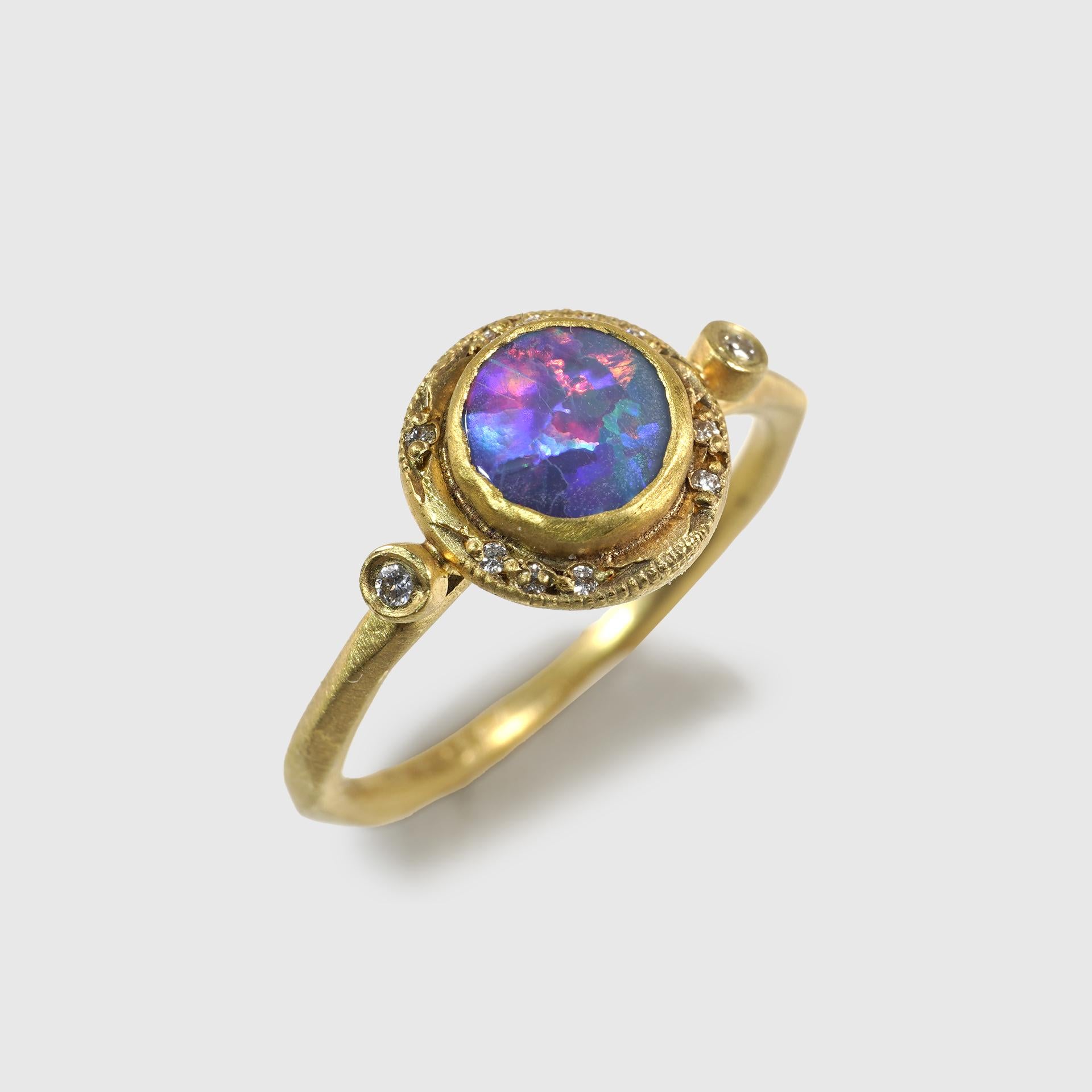 Bluish Purple, 0.60ct Round Australian Boulder Opal, Stackable Ring with Diamond Detail, 24K Solid, Yellow Gold. One of a Kind Ring. This piece would make a great stacker ring.  

Details:
Diamonds: 0.05ct (12 Diamonds)
Opal: 0.60ct.
Size: 6 1/2