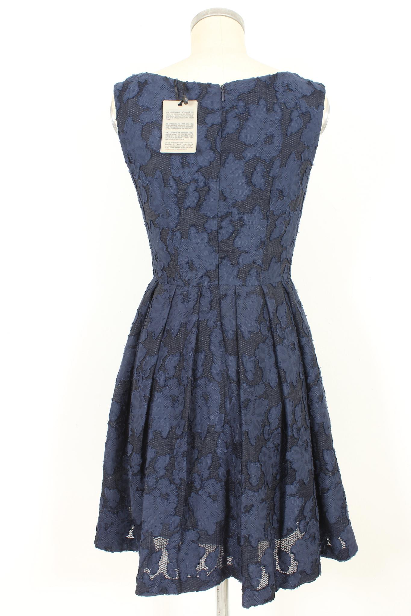 Blumarine by blugirl elegant dress 2000s. Blue flared sheath dress, floral lace pattern. Zip closure on the back. Fabric 76% viscose, 24% polyimide. Made in Italy.

Size: 42 It 8 Us 10 Uk

Shoulder: 40 cm
Bust/Chest: 45 cm
Waist: 35 cm
Length: 93 cm