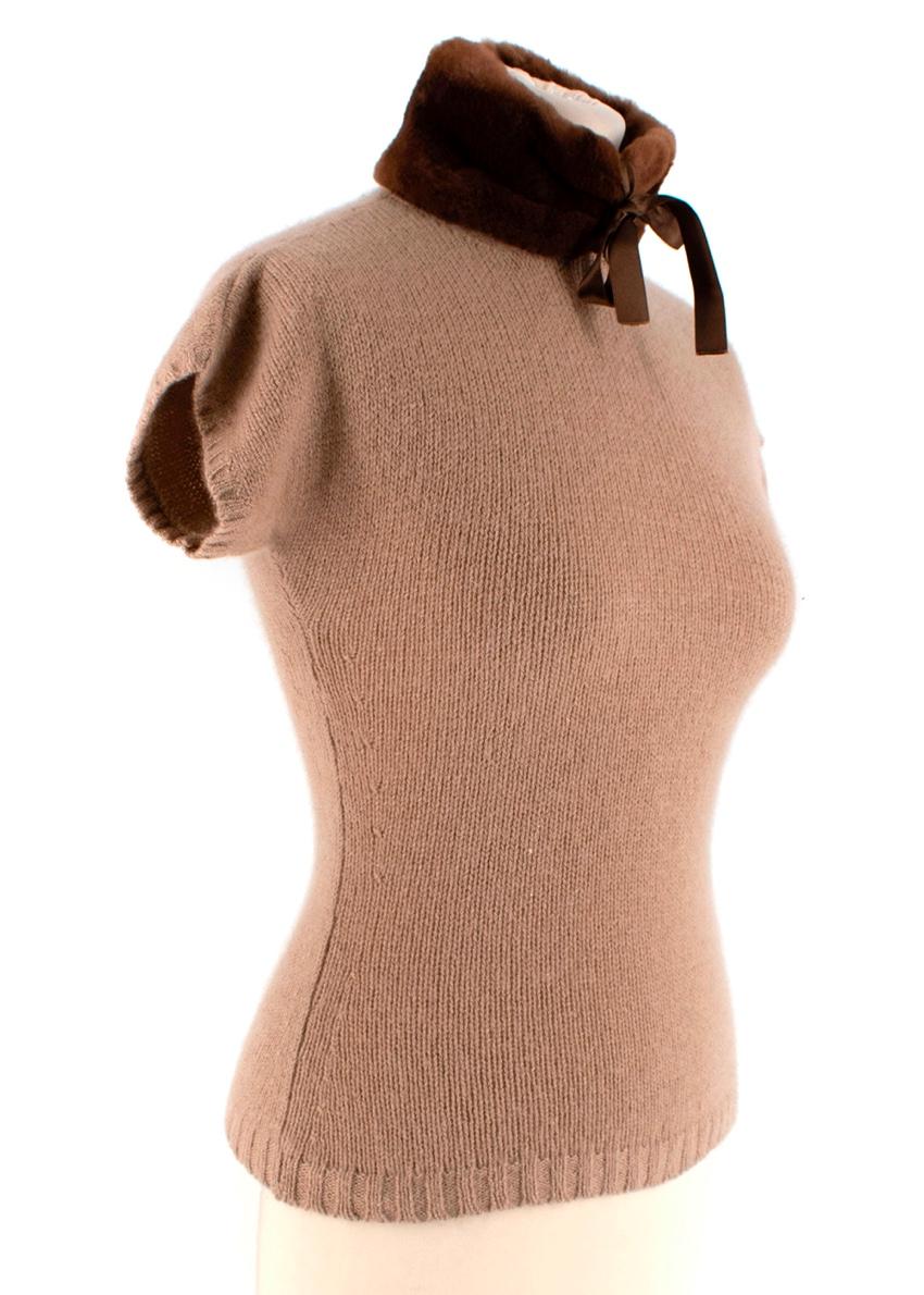Blumarine Brown Cashmere Jumper with Sheared Fur Collar

- Mock neck collar
- Fur lined collar with satin bow 
- Button closure on neck
- Seamless cut
- Super soft fabric
- Ribbed knit hem and cuff
- Keyhole on back 
- Fitted silhouette