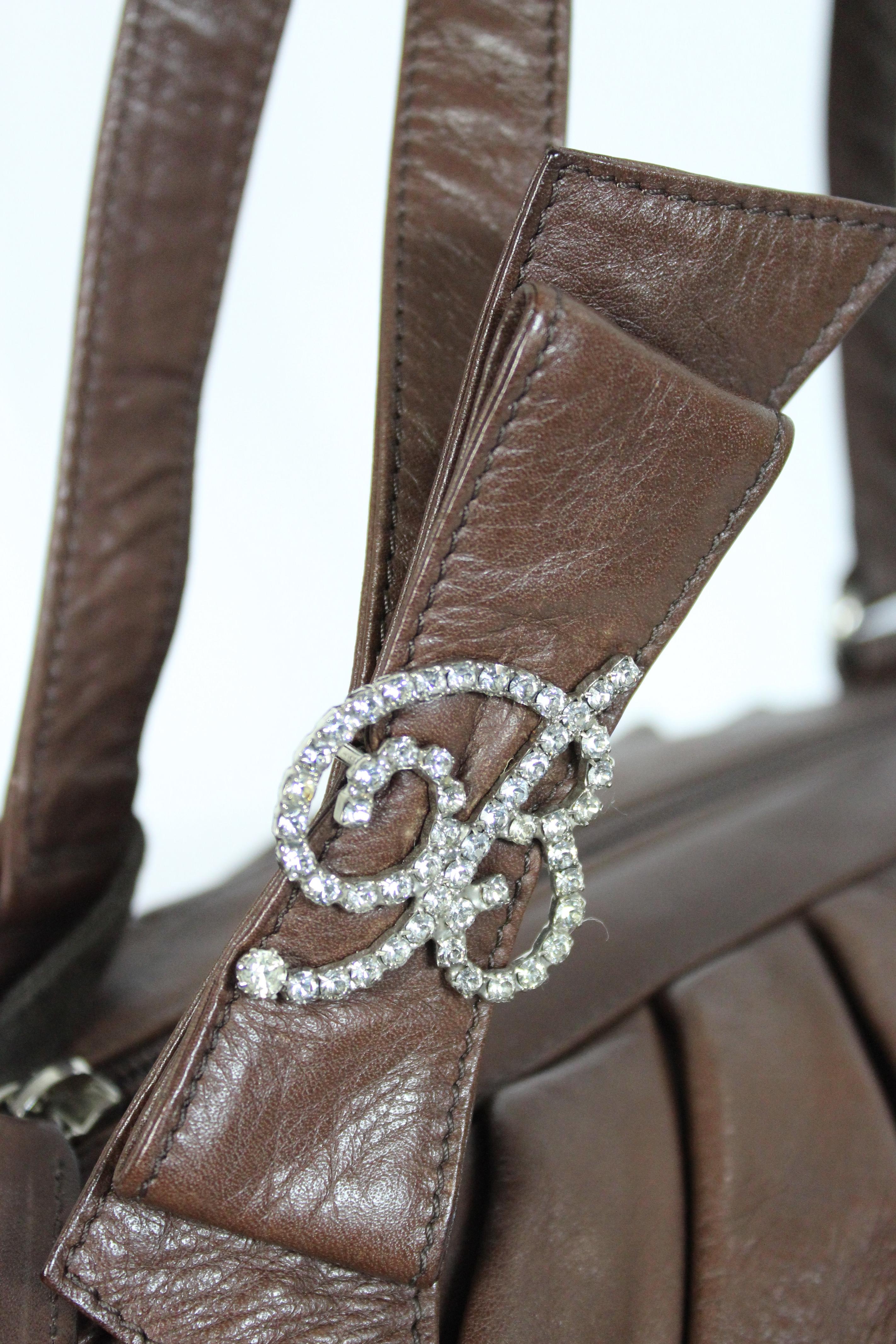 brown satchel bag