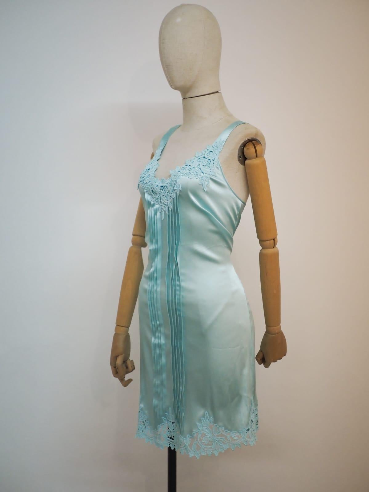 Blumarine light blue silk dress
totally made in italy in size 44
embellished with laces all over