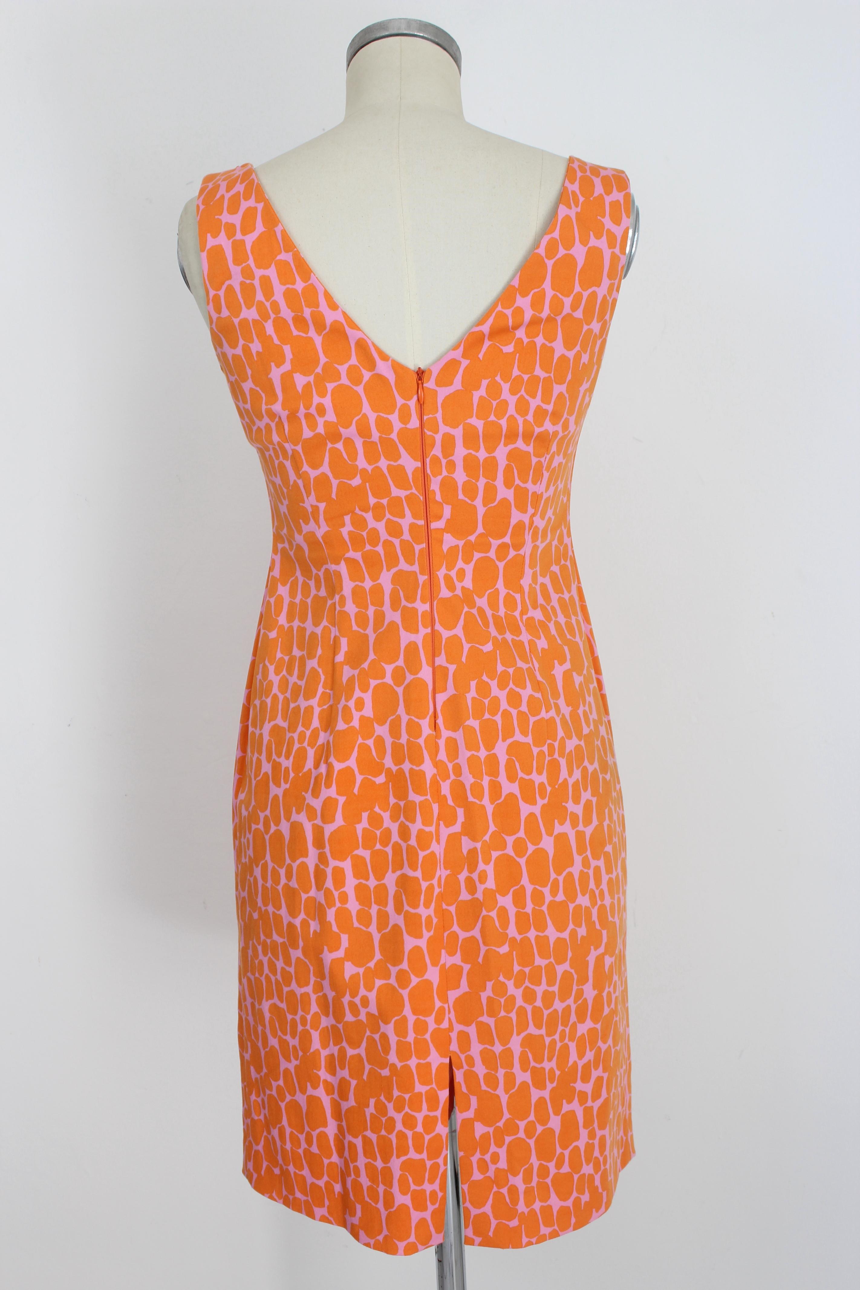 Blumarine 2000s dress. Orange and pink sheath dress with spotted pattern. Sequined applications on the chest. Zip closure along the back. 97% cotton, 3% spandex fabric. Made in Italy.

Size: 42 It 8 Us 10 Uk 

Shoulder: 40 cm
Bust / Chest: 44