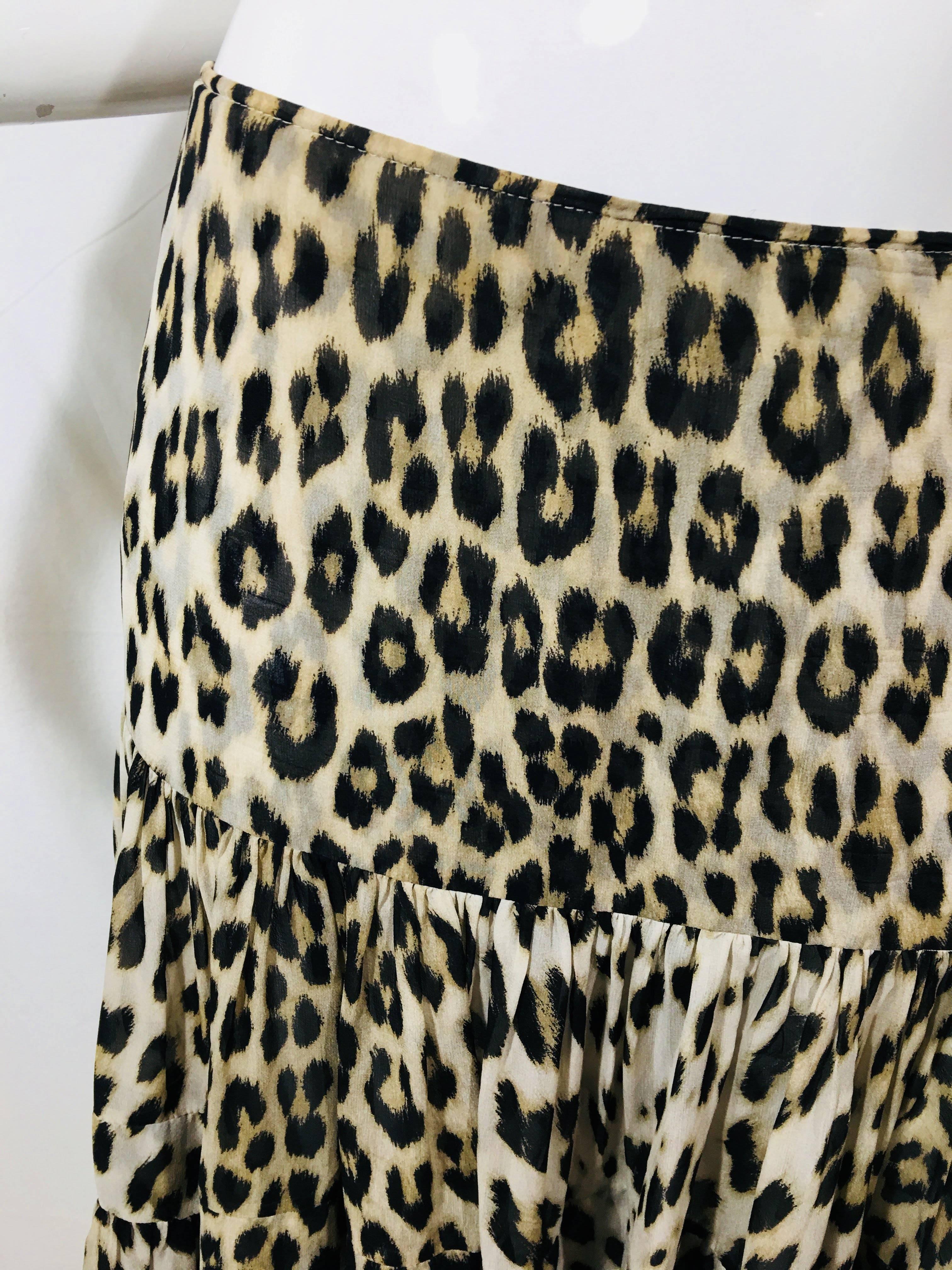 Blumarine Ruffled Skirt with Animal Print and Chevron Cut Hem.