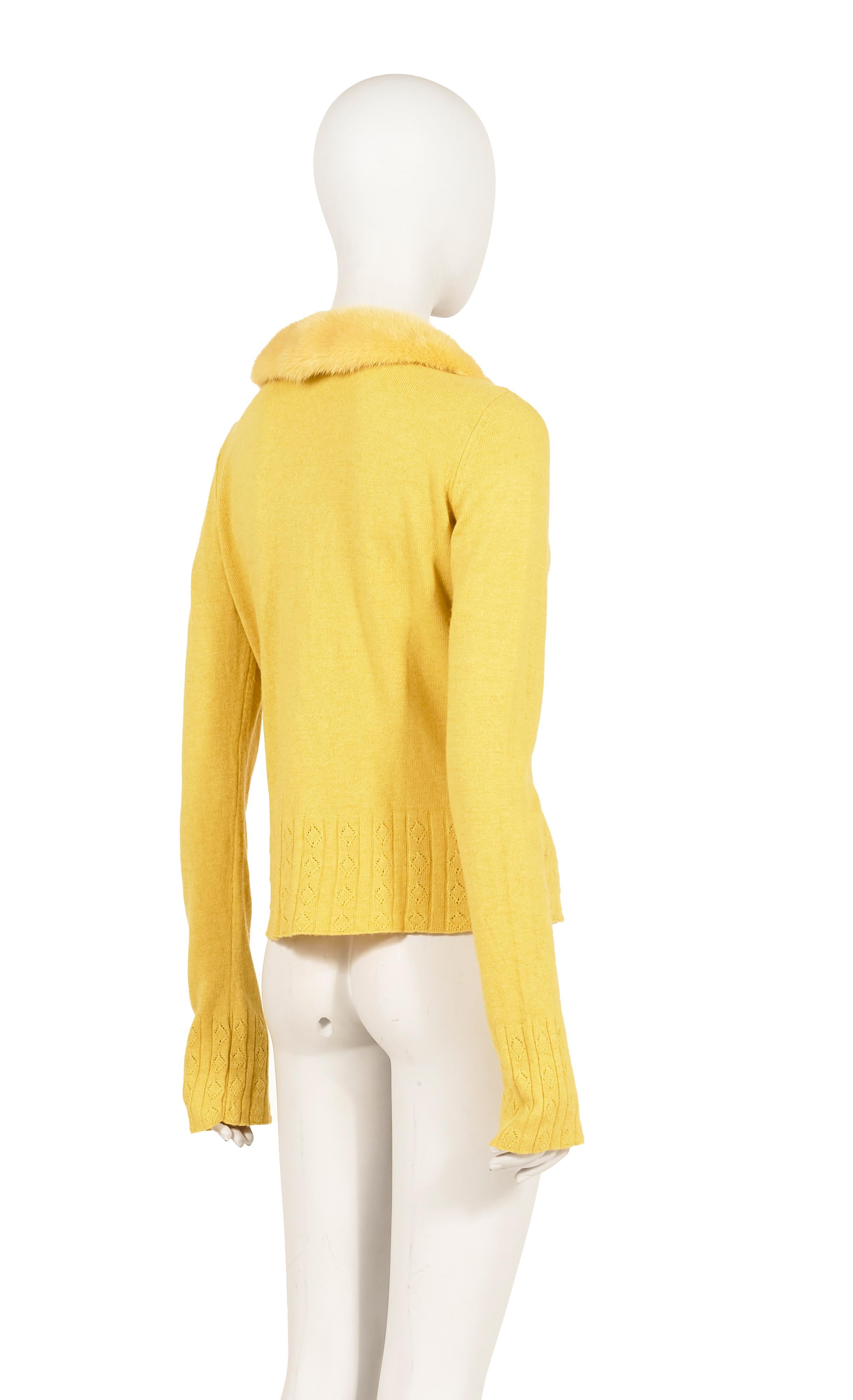 - Blumarine by Anna Molinari
- Sold by Gold Palms Vintage 
- Spring Summer 2005 collection
- Yellow Knit wool cardigan
- Gold-toned monogram logo rhinestone motif
- Yellow mink fur collar
- Size: IT 46 

Measurements (laid flat)

Shoulder to