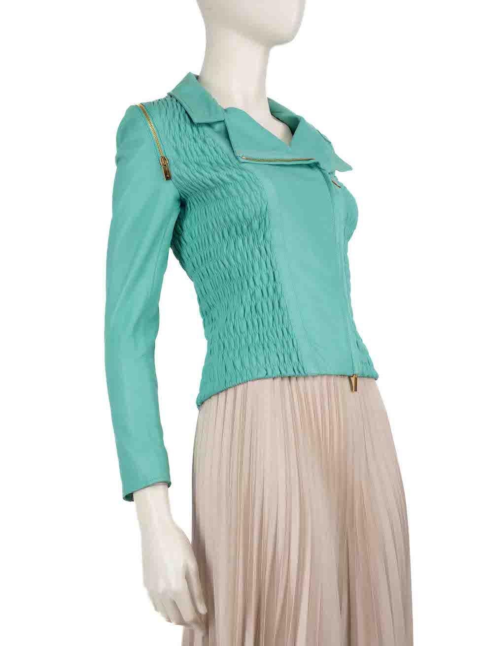 CONDITION is Very good. Minimal wear to the jacket is evident. Light discolouration marks to the left collar, front bottom-right, rear sleeves, cuffs and internal left hemline. A small hole in the bottom left lining and tarnishing to the zip on the