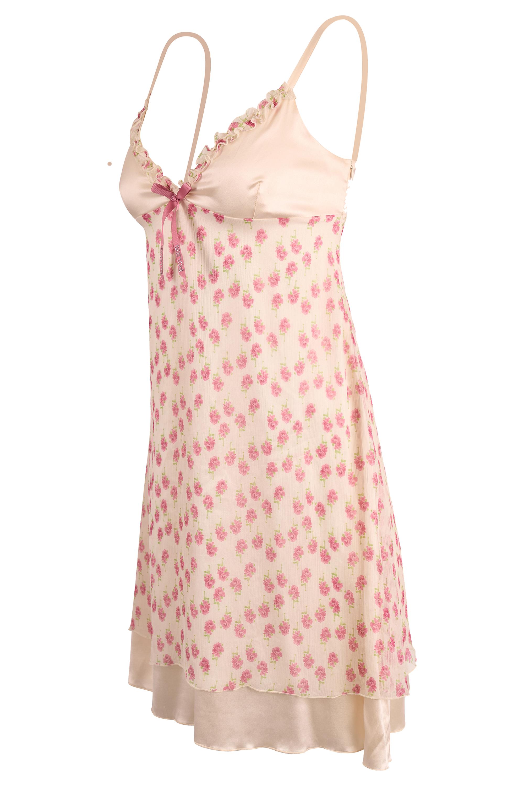 Mini robe en soie florale Blugirl by Blumarine. Il est doté de fines bretelles réglables, d'un ourlet à volants en laitue à l'encolure, d'un ruban à nœud rose 