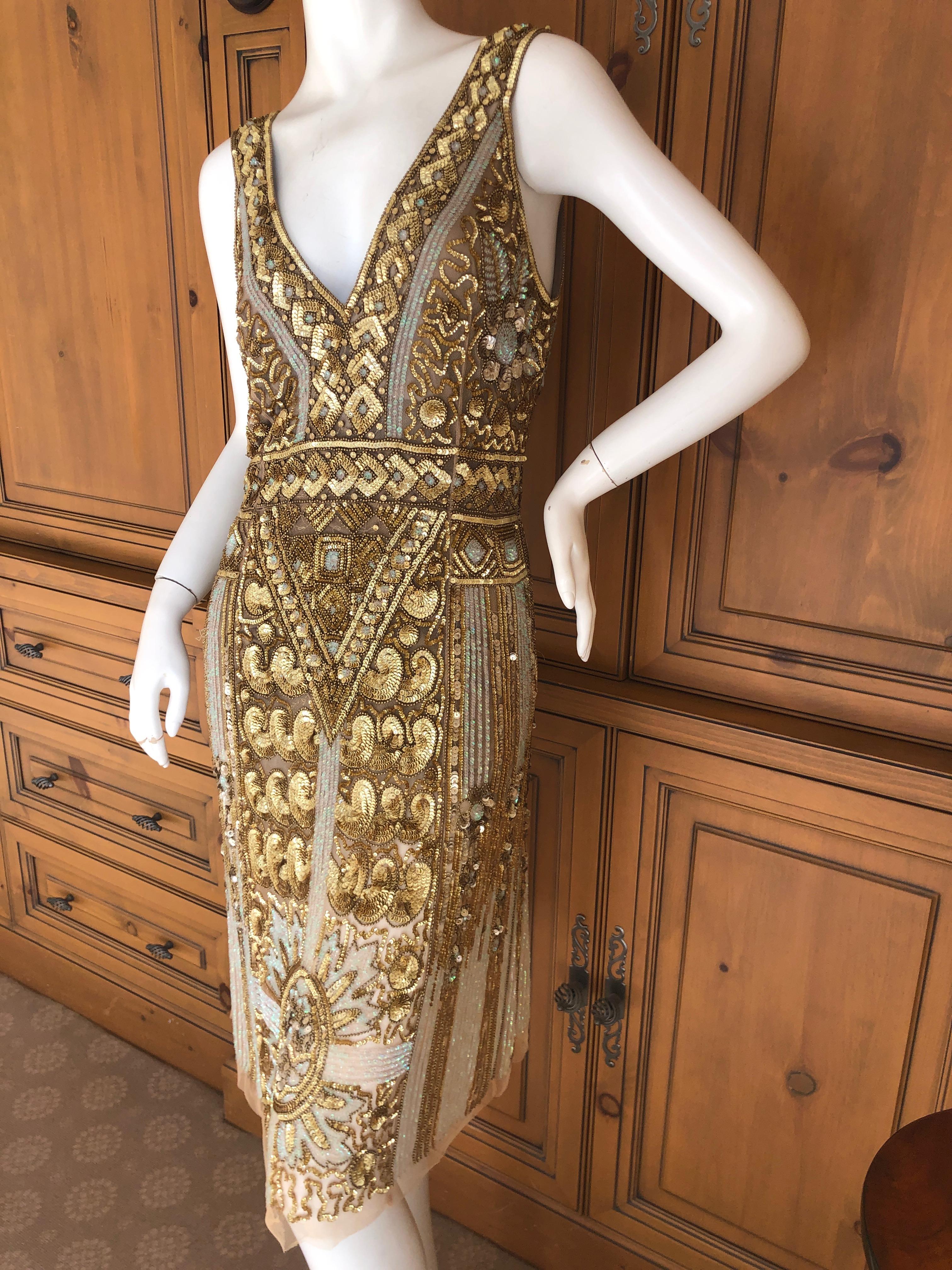 Blumarine Vintage Gold Low Cut Flapper Sheath Dress w Art Deco Pattern Sequins
So pretty, please use the zoom feature to see details.
 Size 40 It
Bust 38