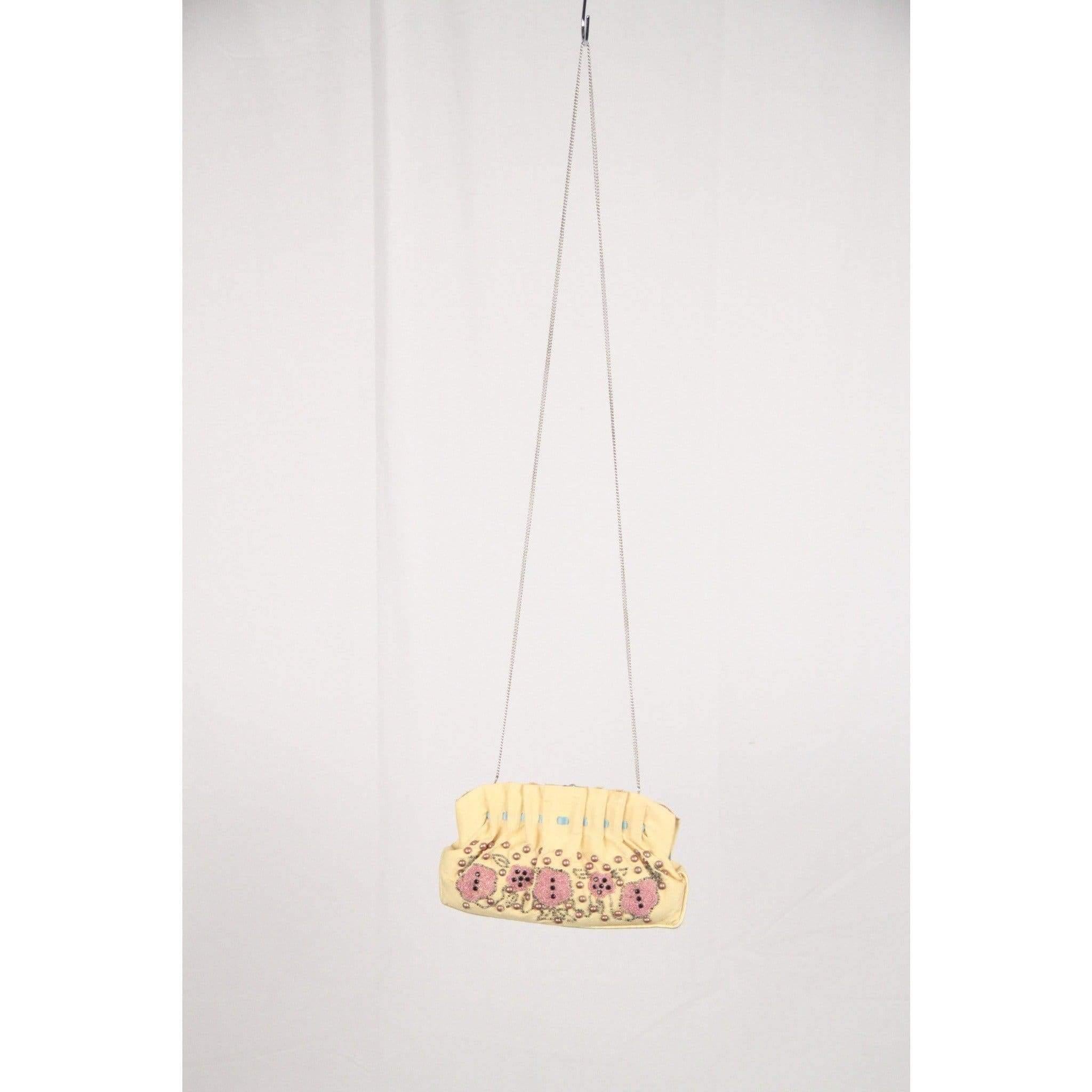 Blumarine embellished yellow fabric evening bag - Kiss lock clasp - Hand-embroidered beading on the front - Gathered pleats and bow detailing - Long silver metal chain (49 inches - 124,4 cm) - Inside is lined in pink satin fabric - 1 small open