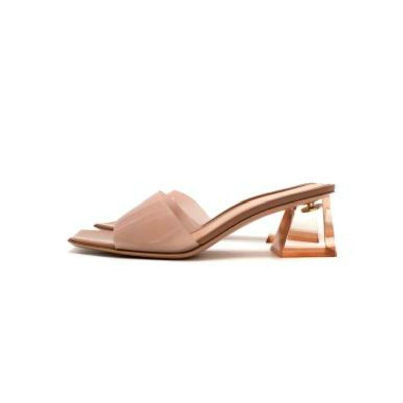Gianvito Rossi Blush Cosmic Mule 55
 
 - Square Toe Slip-On Mule
 - Perspex block heel
 - PVC Vamp
 - Patent Trimmed
 - True to size
 
 Made in Italy