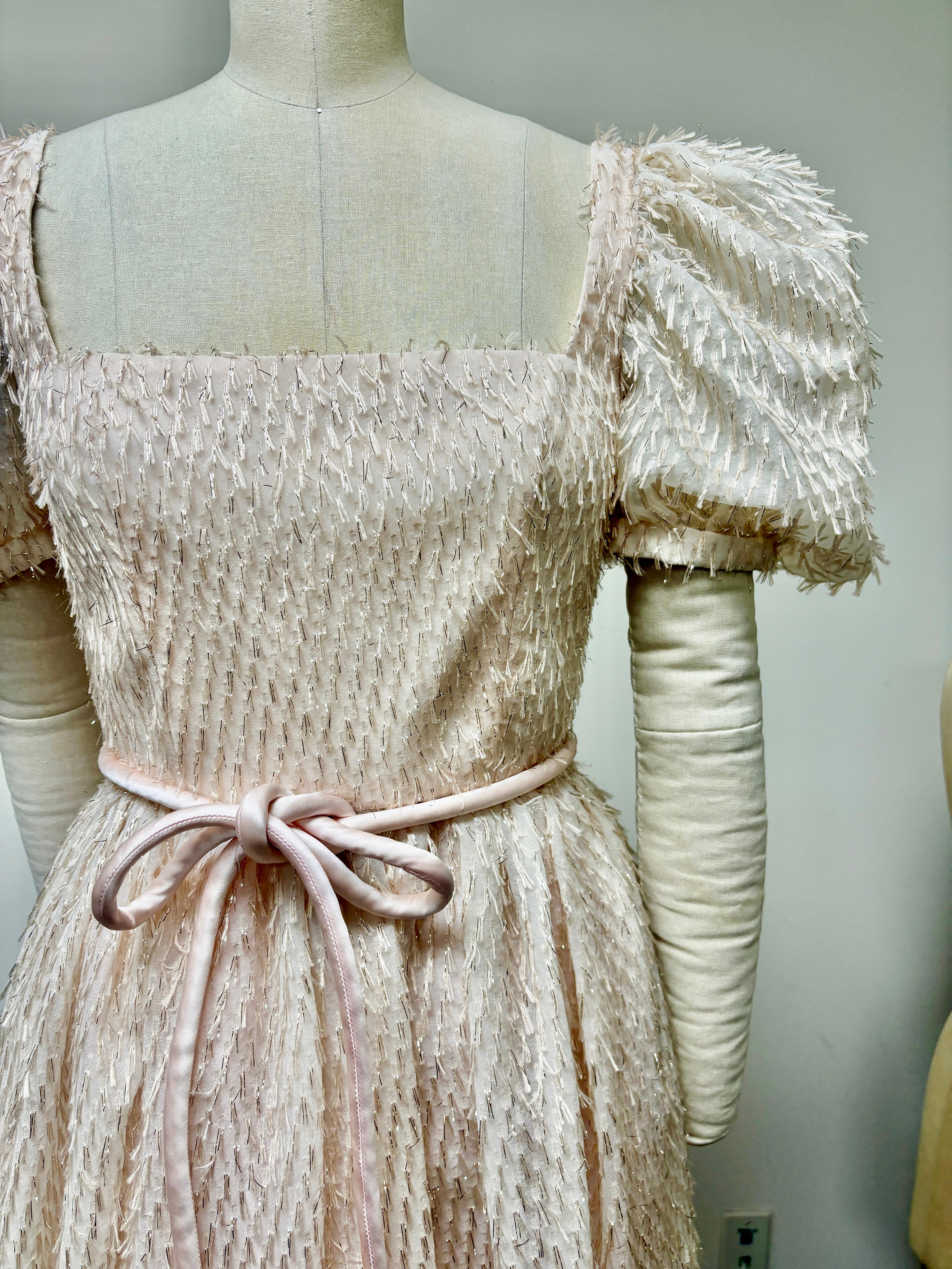 Blush Eyelash Brocade Puff Sleeve Gown with Gathered Skirt and Satin Corded Belt For Sale 6