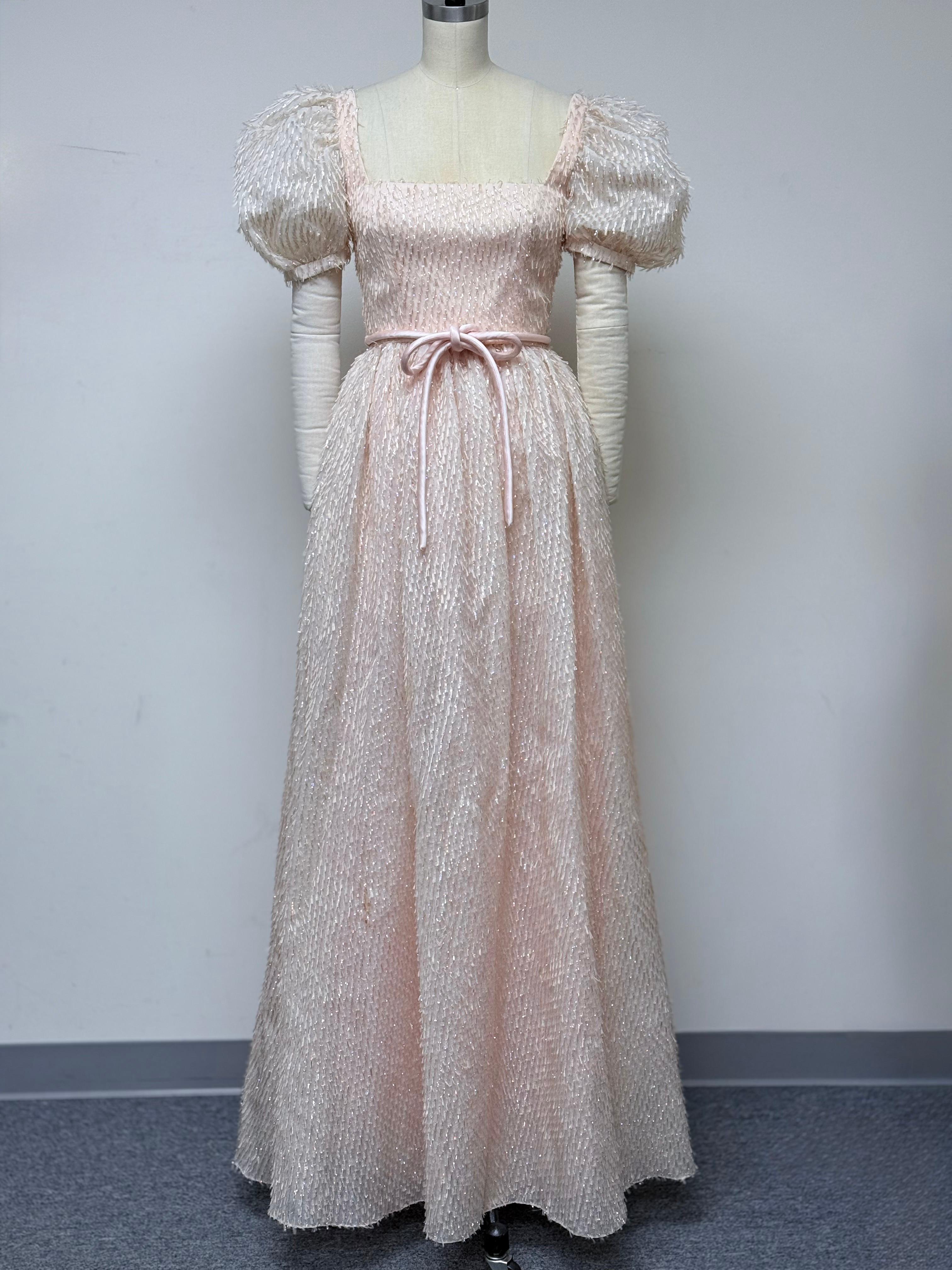 The prettiest blush pink and gold eyelash French brocade gown... glittering elegance for magical moments!
As soft as the palest pink rose petal with an alluring gold sparkle. Feminine and elegant 
worn with gold jewelry for the perfect wedding
or