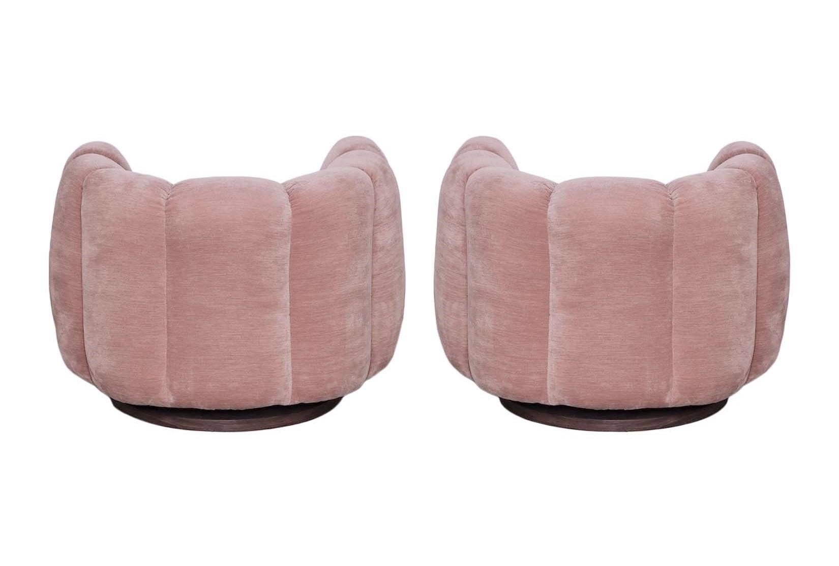 Late 20th Century Blush Pink Pair Channel Back Swivel Chairs in the Style of Milo Baughman For Sale